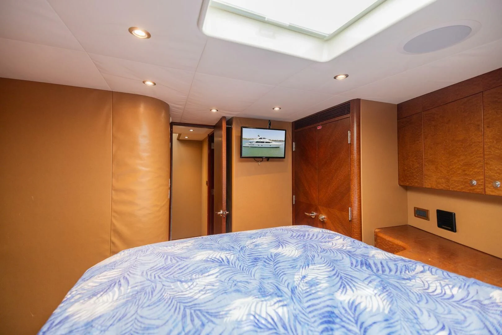a bed in a room aboard PREDATOR I Yacht for Sale