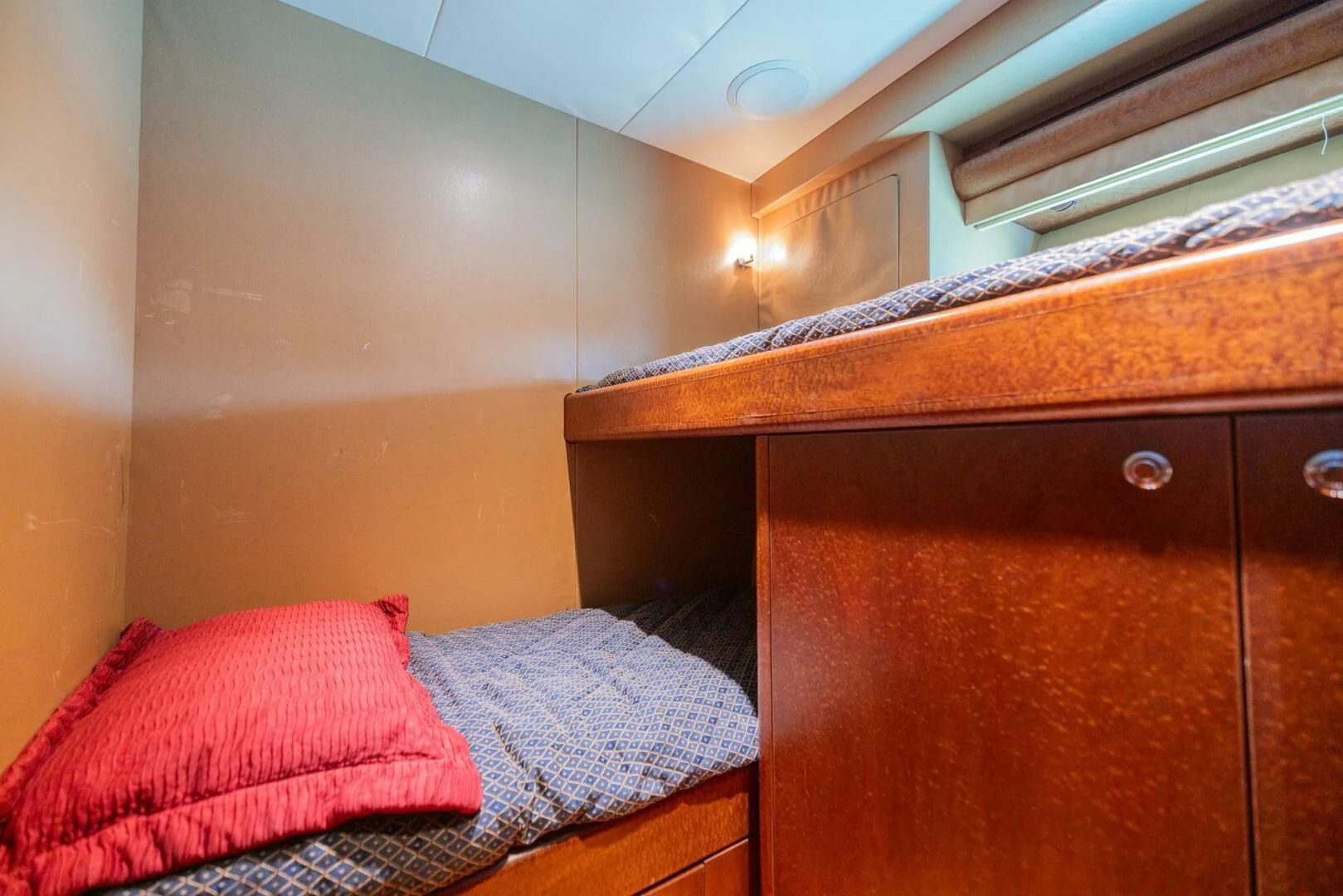 a bed in a room aboard PREDATOR I Yacht for Sale
