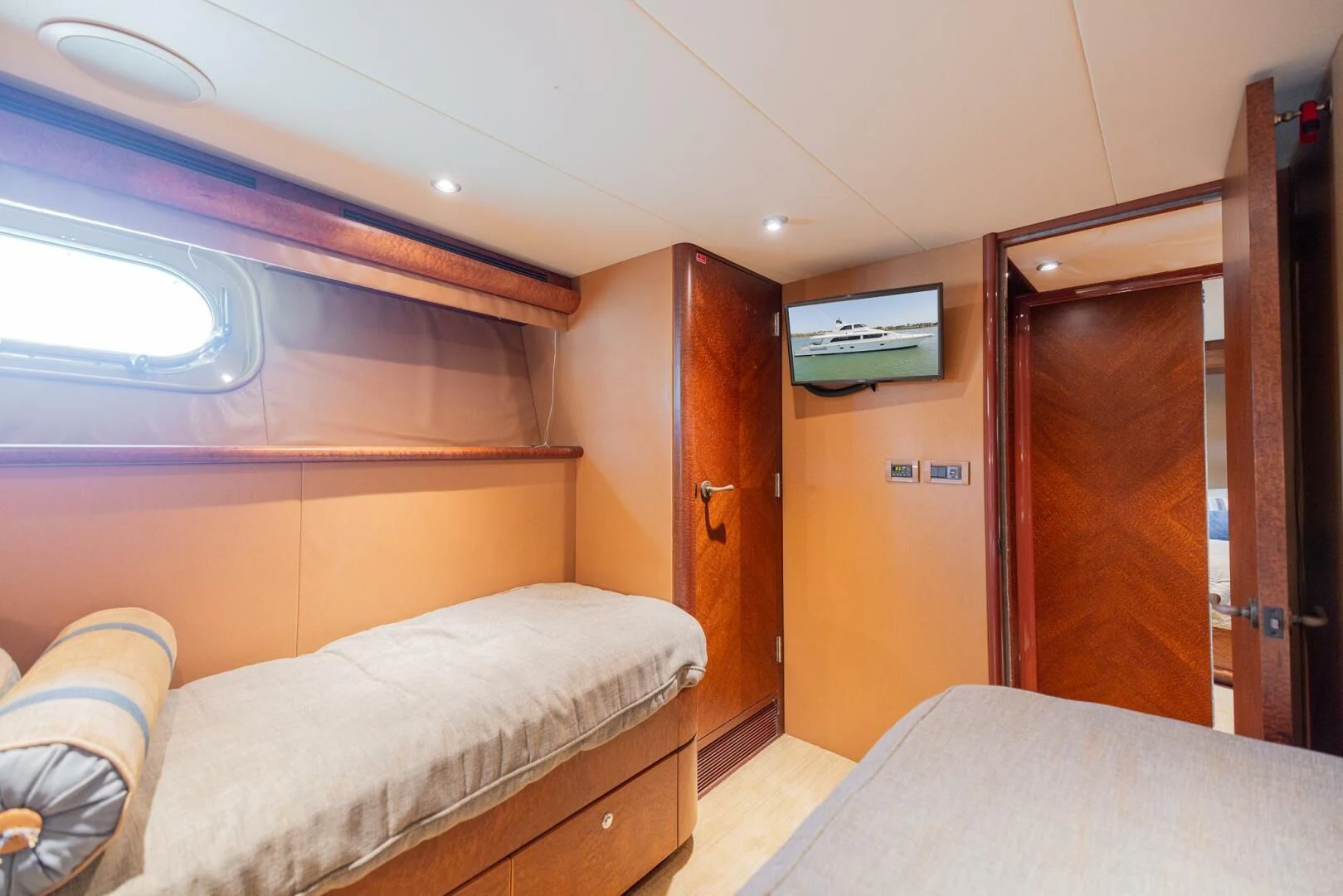 a room with two beds aboard PREDATOR I Yacht for Sale
