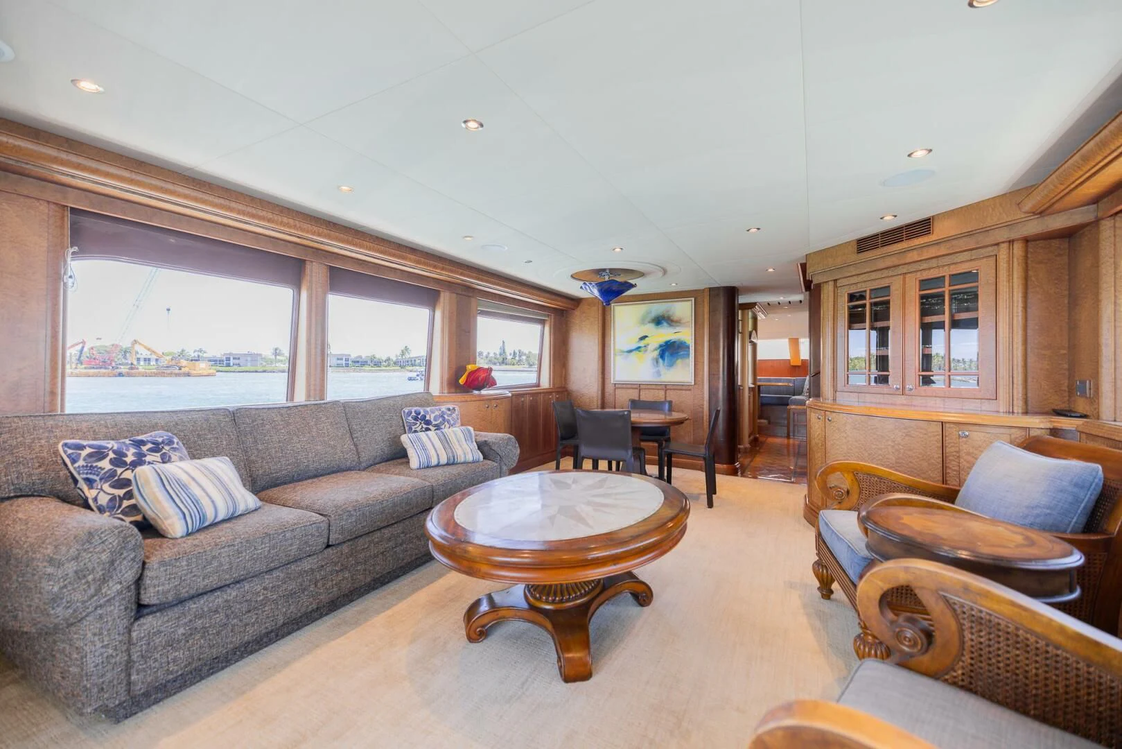 a living room with a leather couch aboard PREDATOR I Yacht for Sale