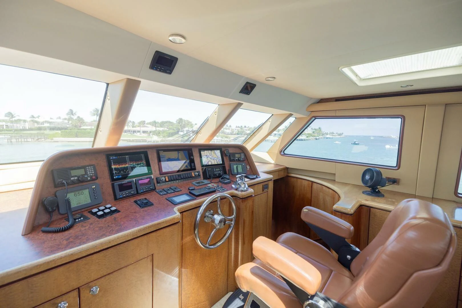 a room with a desk and computer aboard PREDATOR I Yacht for Sale