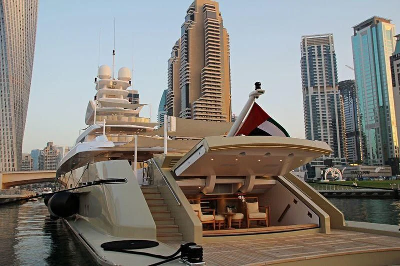 a boat on a dock aboard SMERALDA Yacht for Sale