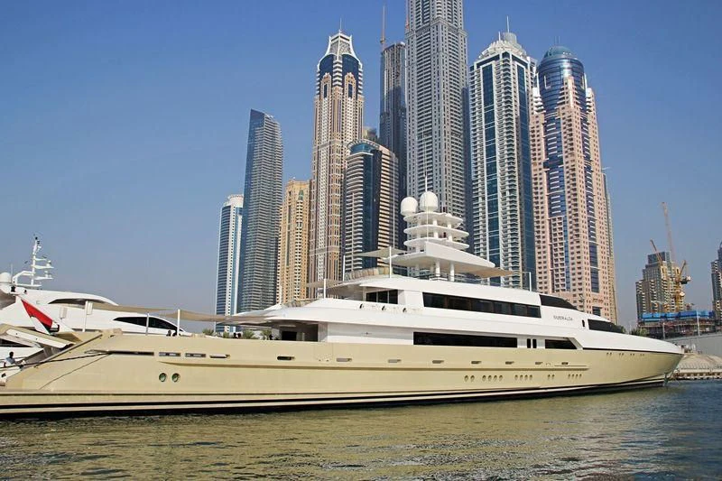 a white yacht in the water aboard SMERALDA Yacht for Sale