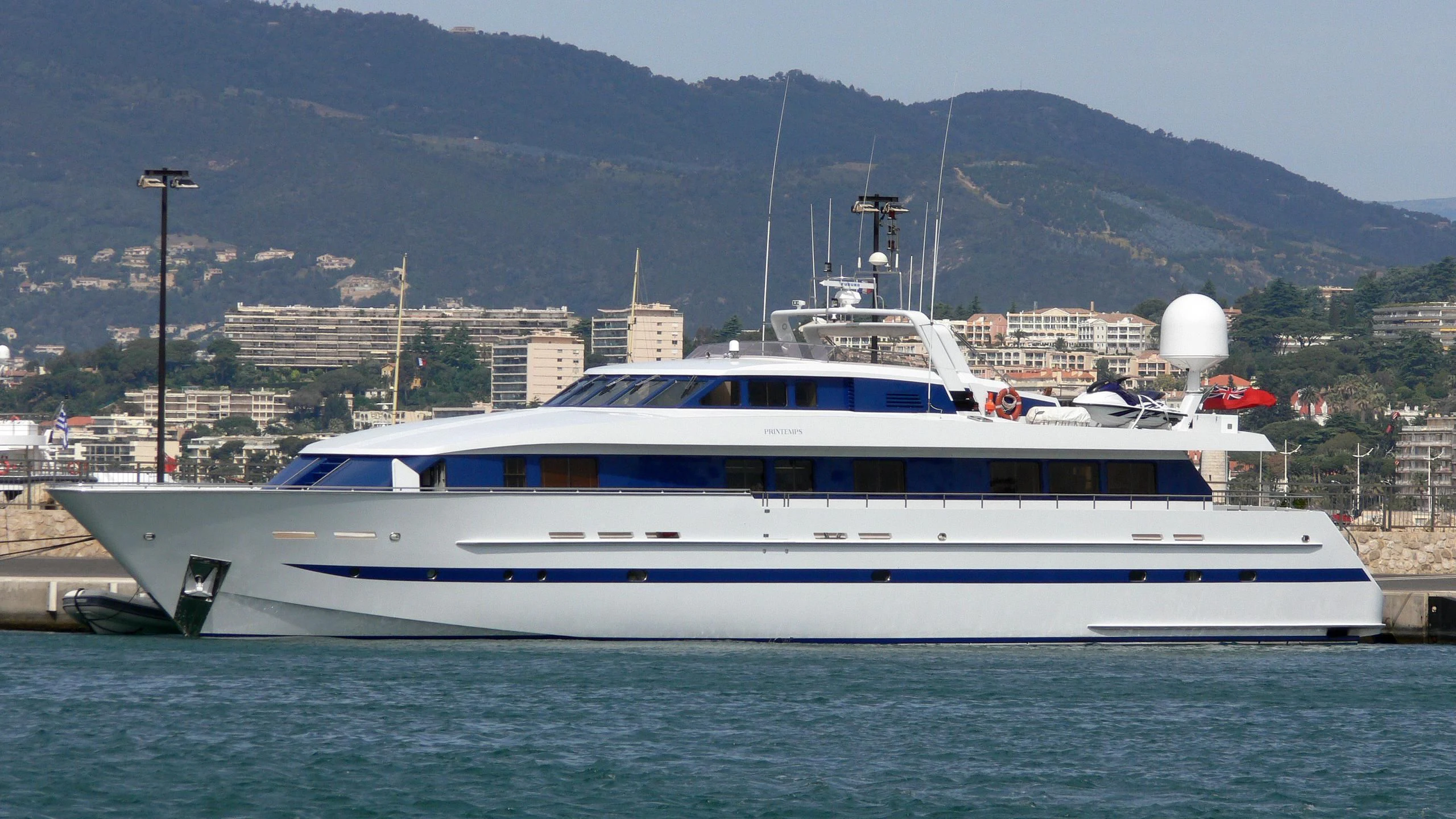 a large white boat in the water aboard ESRA Yacht for Sale