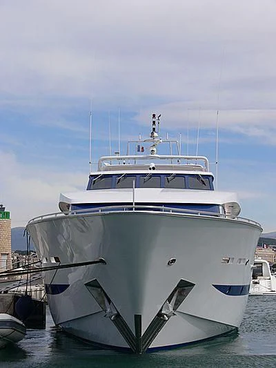 a large white boat in the water aboard ESRA Yacht for Sale