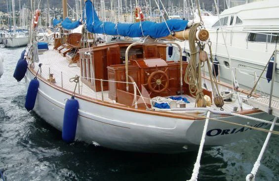 a boat with a blue and red propeller aboard ORIANDA Yacht for Charter