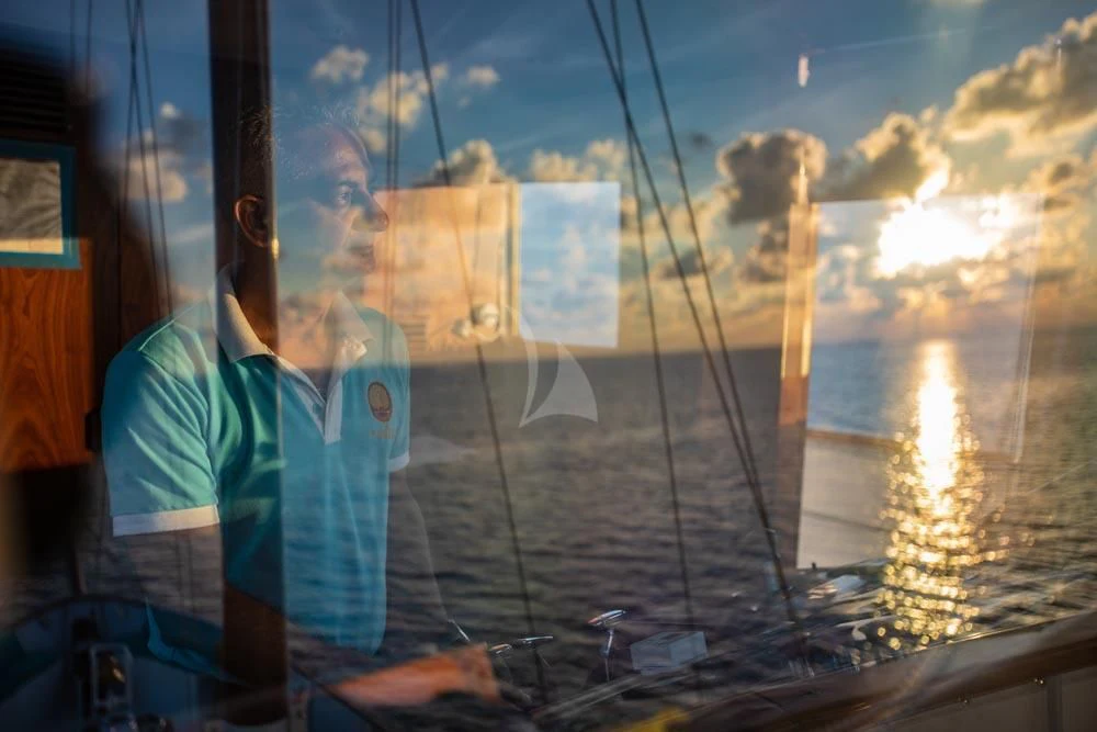 a person on a boat aboard KALIZMA Yacht for Sale