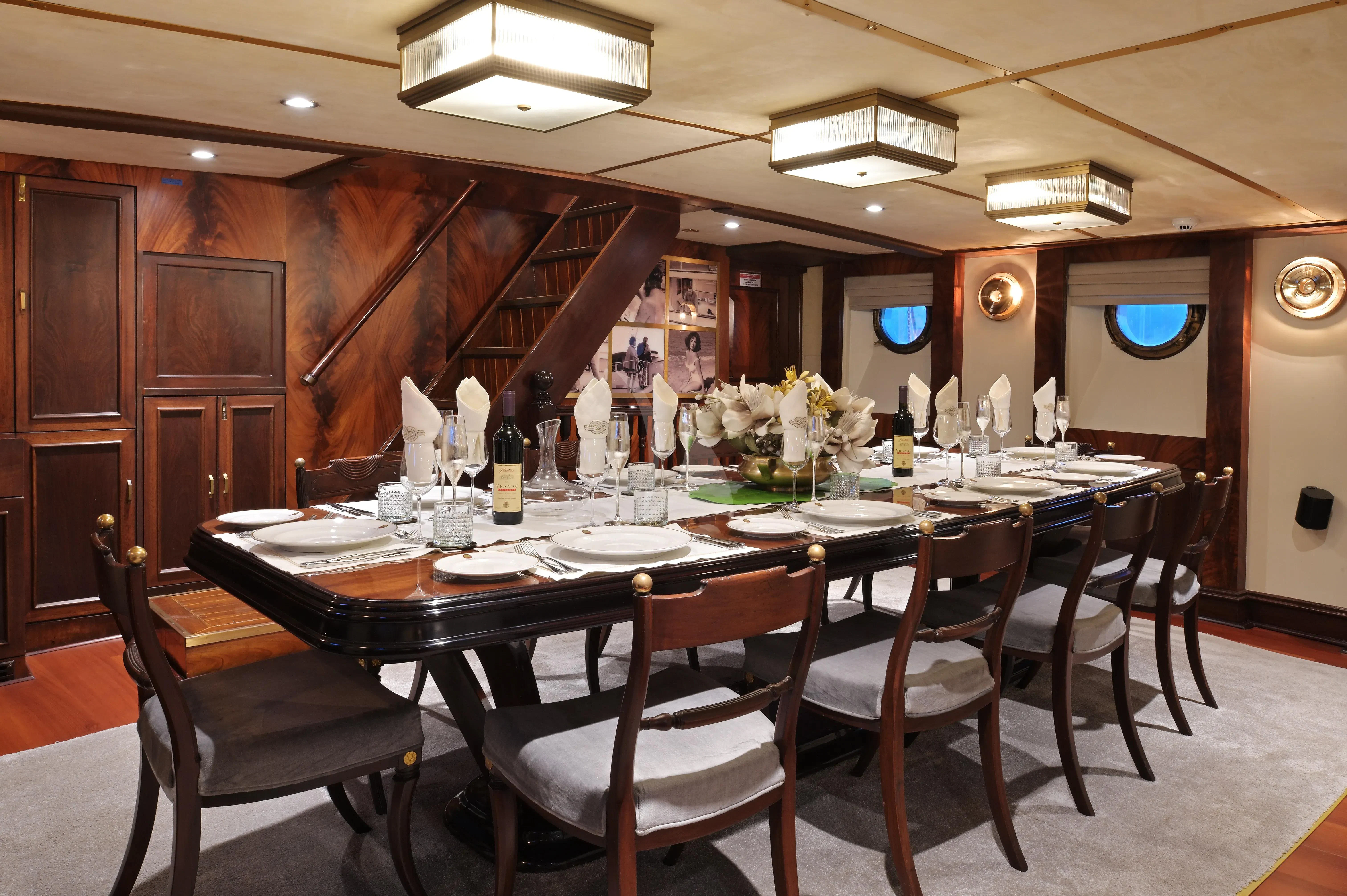 a dining table set for a dinner aboard KALIZMA Yacht for Sale