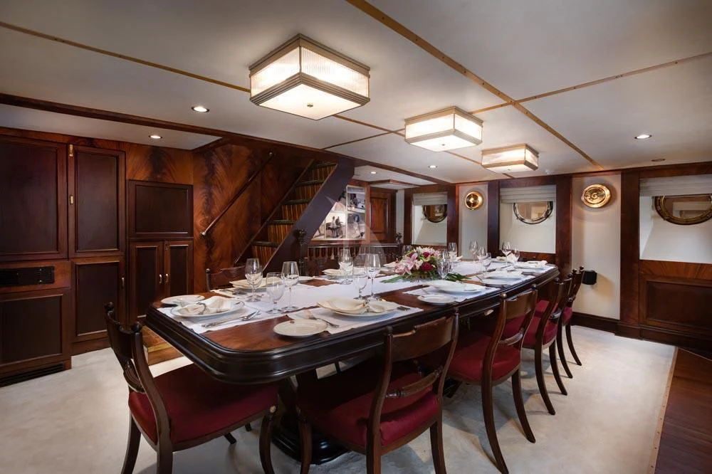 a dining table in a kitchen aboard KALIZMA Yacht for Sale