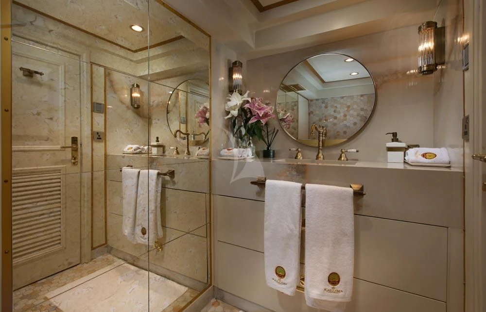 a bathroom with a large mirror aboard KALIZMA Yacht for Sale