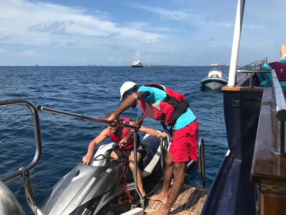 a couple of people on a boat aboard KALIZMA Yacht for Sale