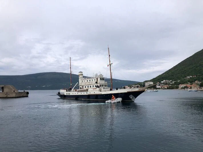 a large ship in the water aboard KALIZMA Yacht for Sale