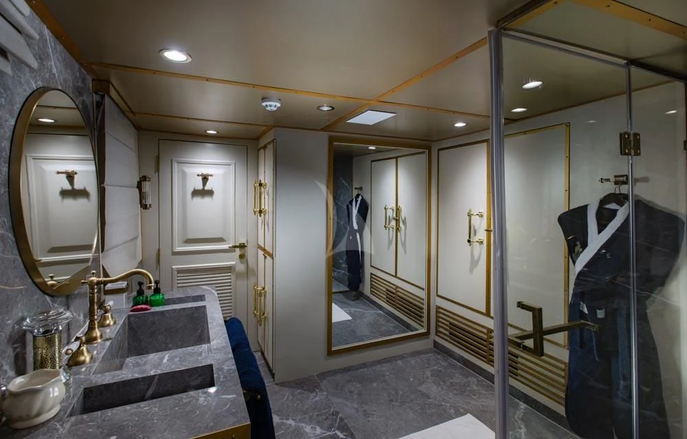 a bathroom with a marble counter top aboard KALIZMA Yacht for Sale