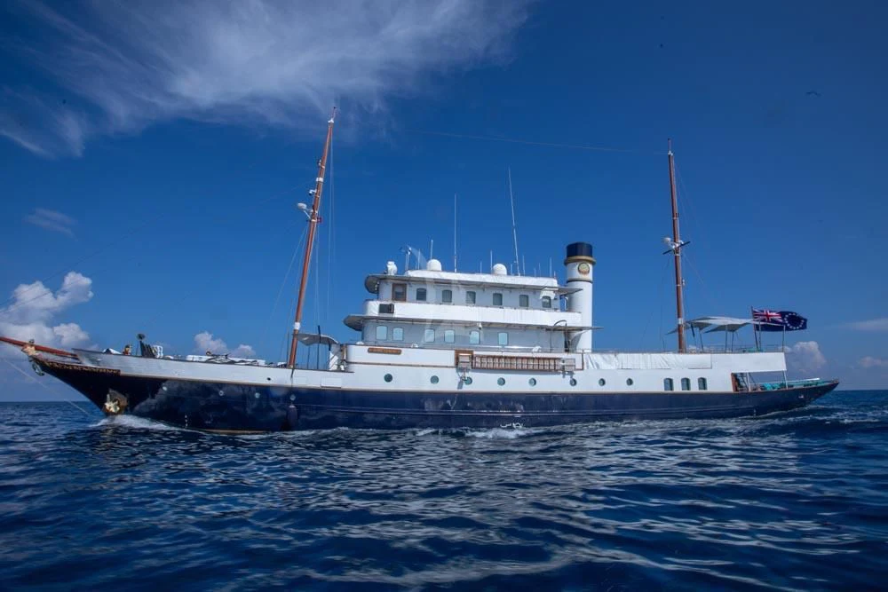 a large white boat in the water aboard KALIZMA Yacht for Sale