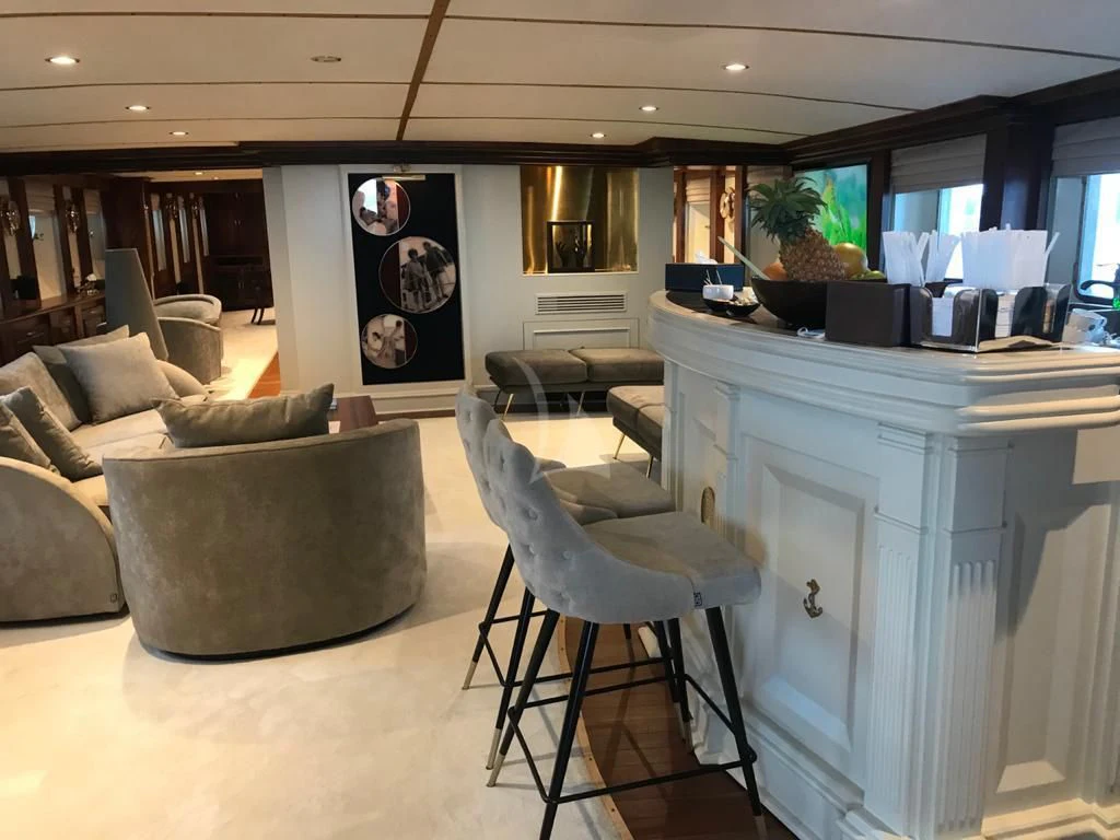 a room with a couch and a desk aboard KALIZMA Yacht for Sale