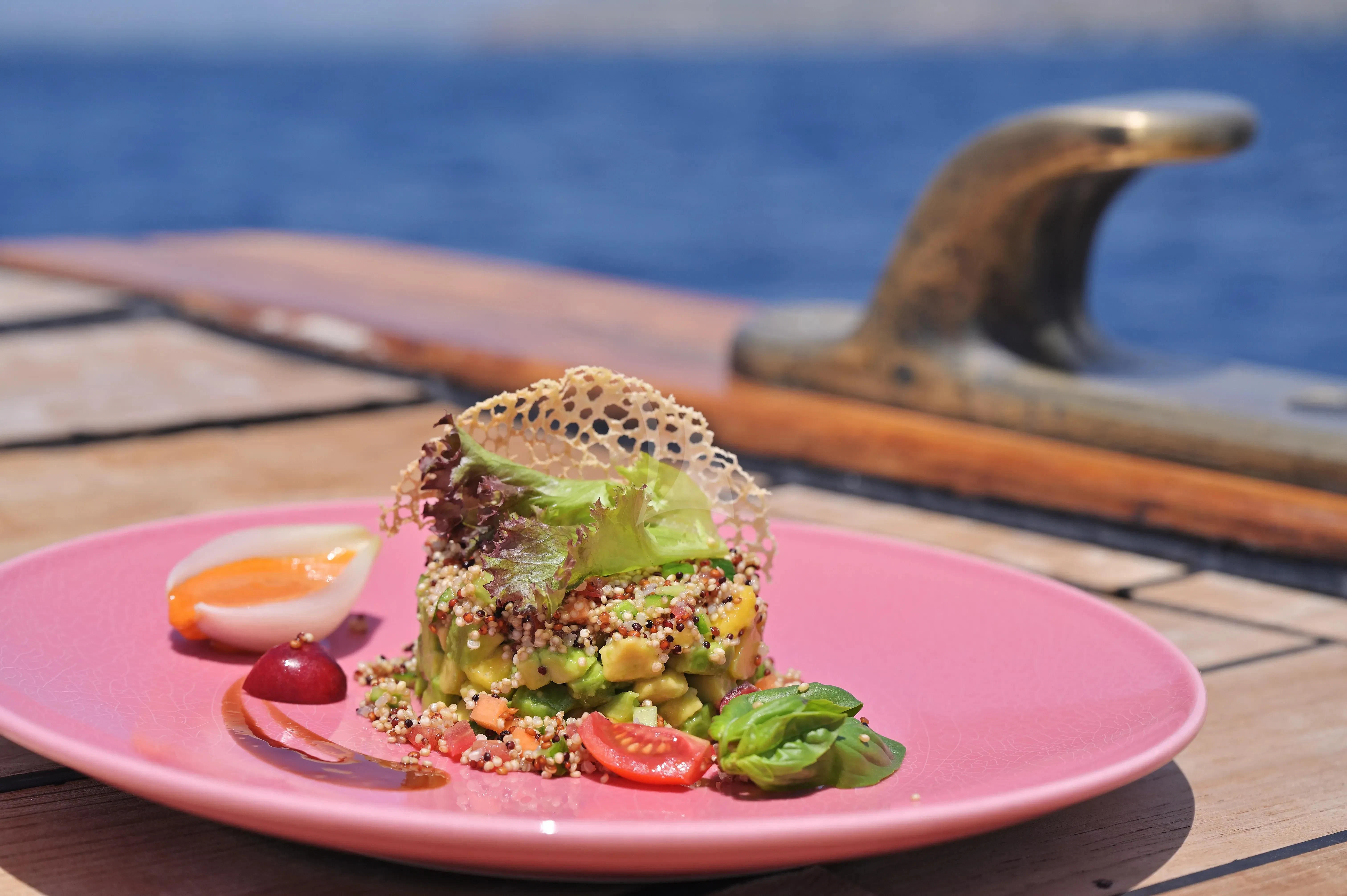 a plate of food aboard KALIZMA Yacht for Sale