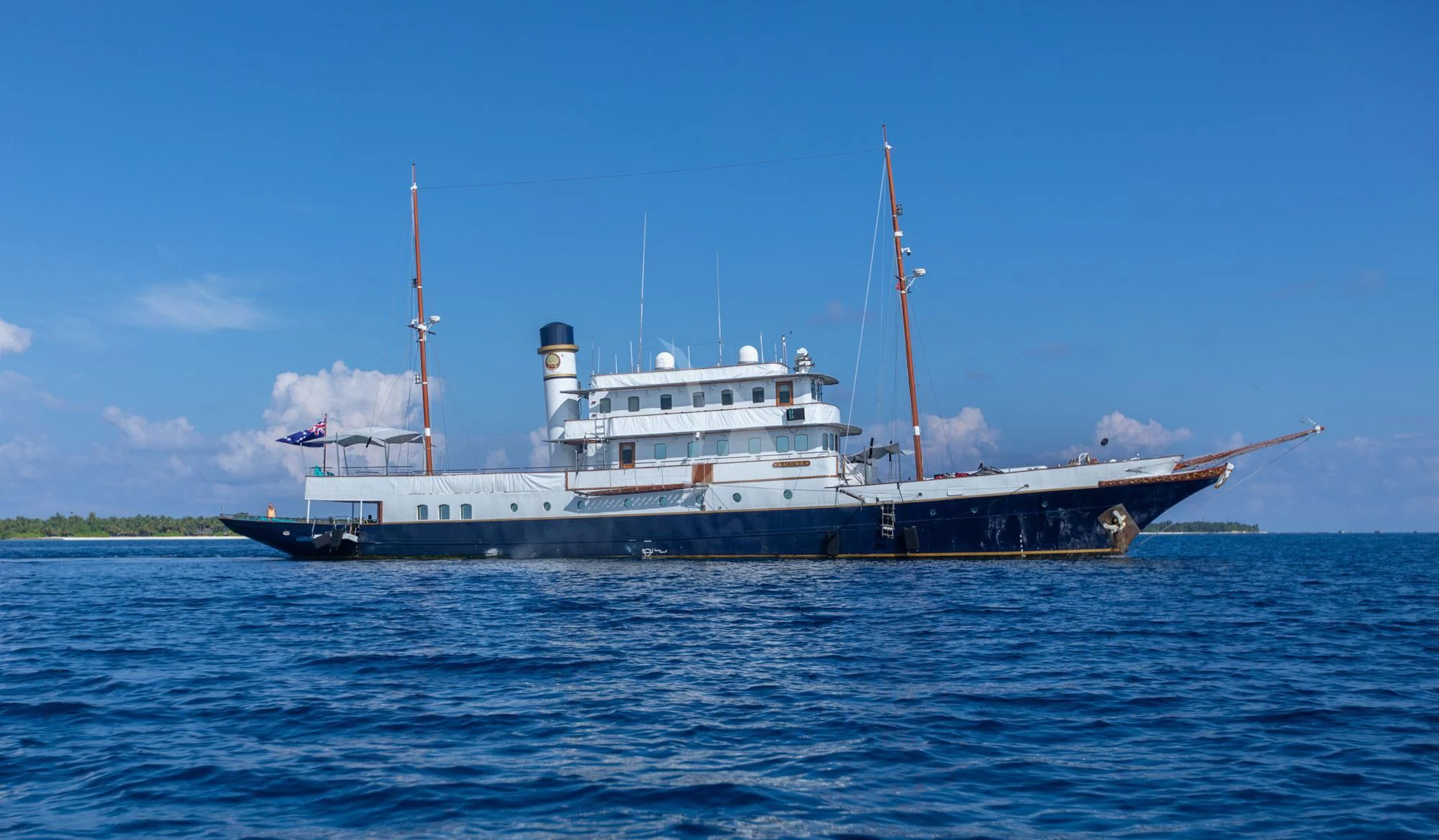 a large white ship in the water aboard KALIZMA Yacht for Sale