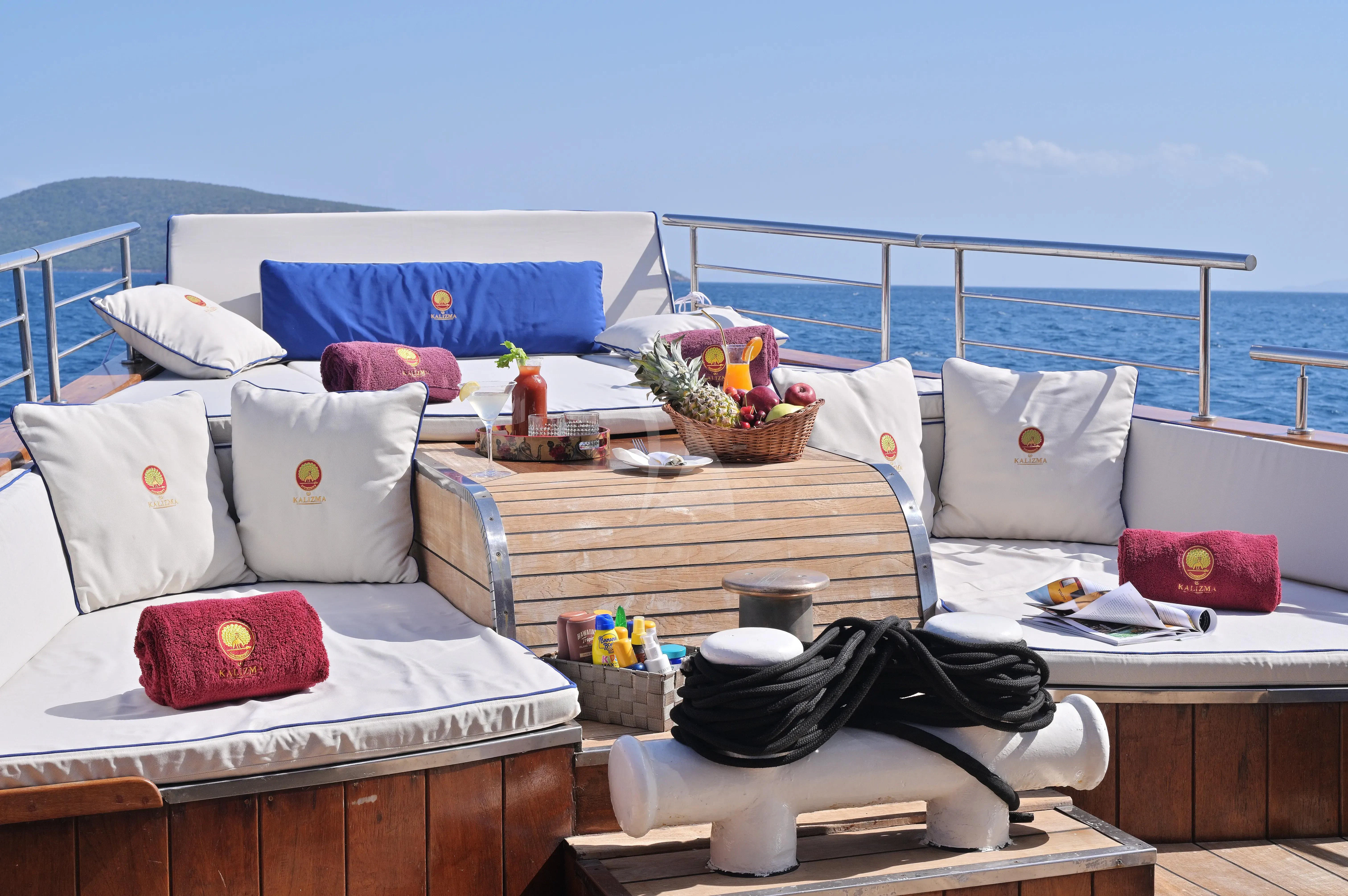a boat with pillows and blankets on a boat aboard KALIZMA Yacht for Sale