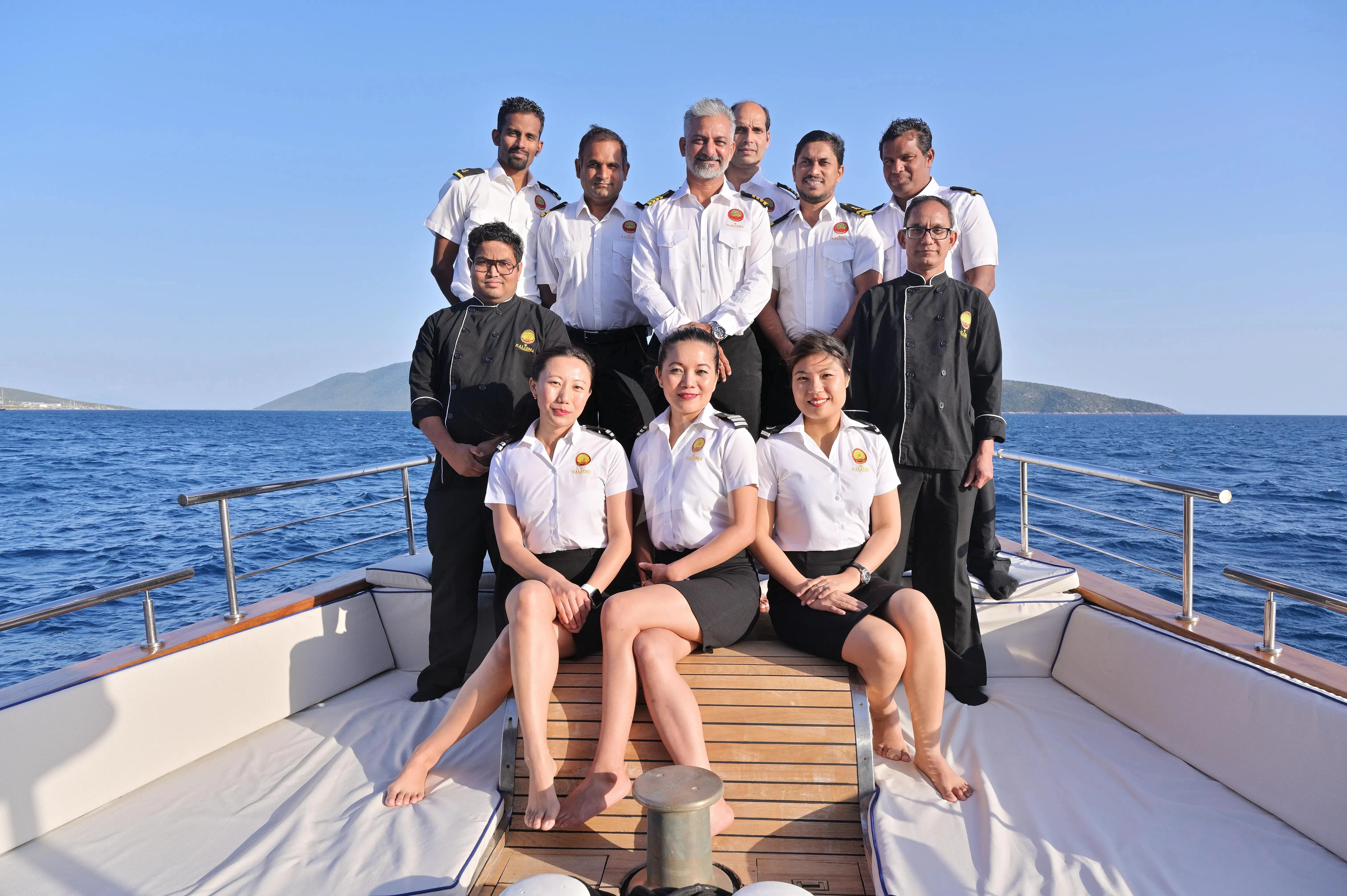 a group of people on a boat aboard KALIZMA Yacht for Sale