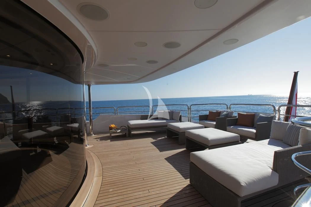 a boat with a large deck aboard LATIKO Yacht for Charter