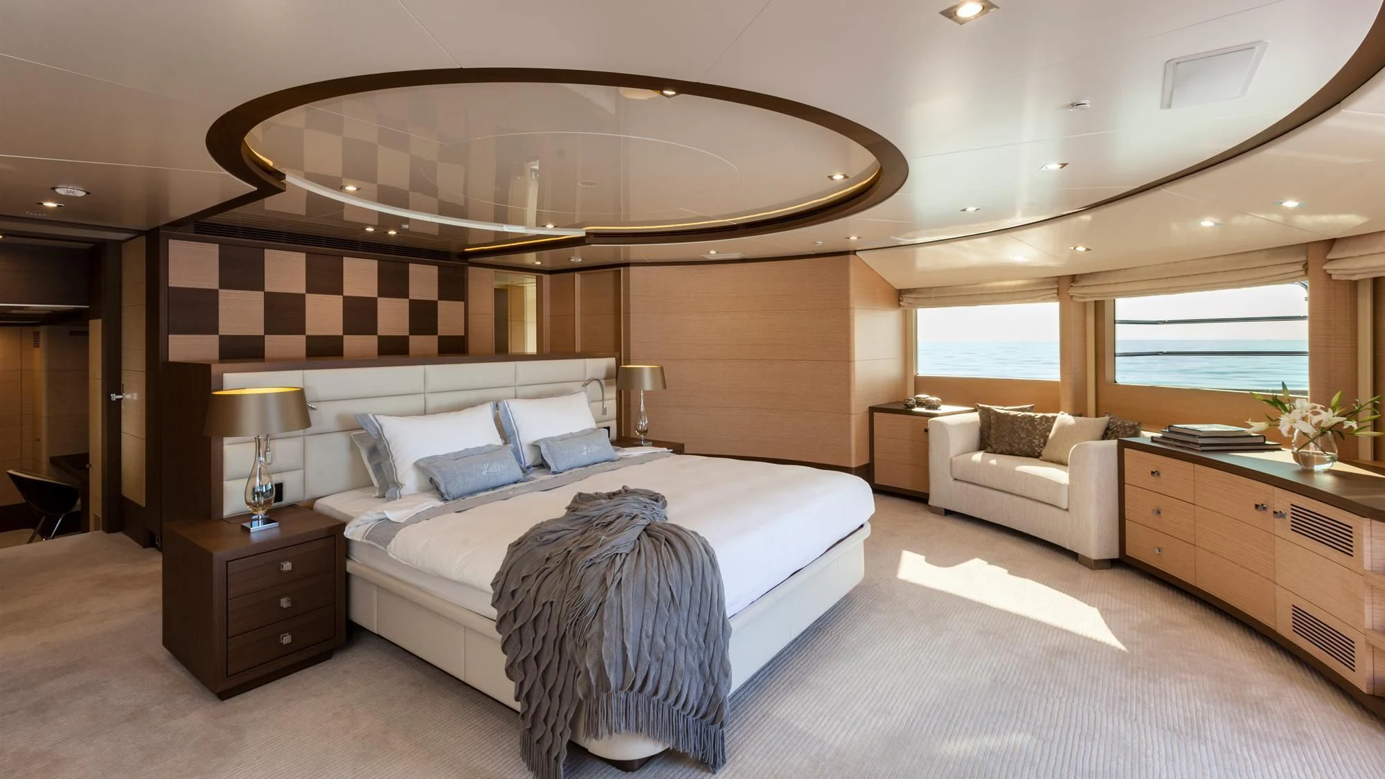 a large bedroom with a large bed aboard LATIKO Yacht for Charter