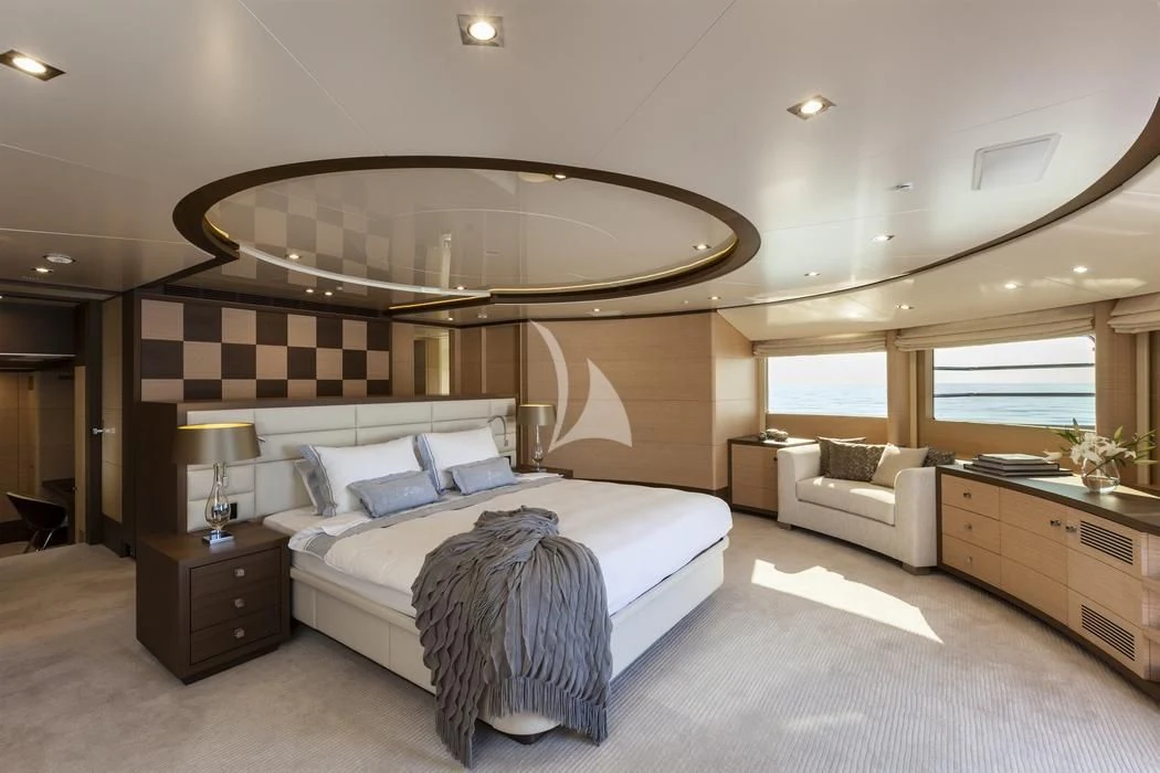a large bedroom with a large bed aboard LATIKO Yacht for Charter