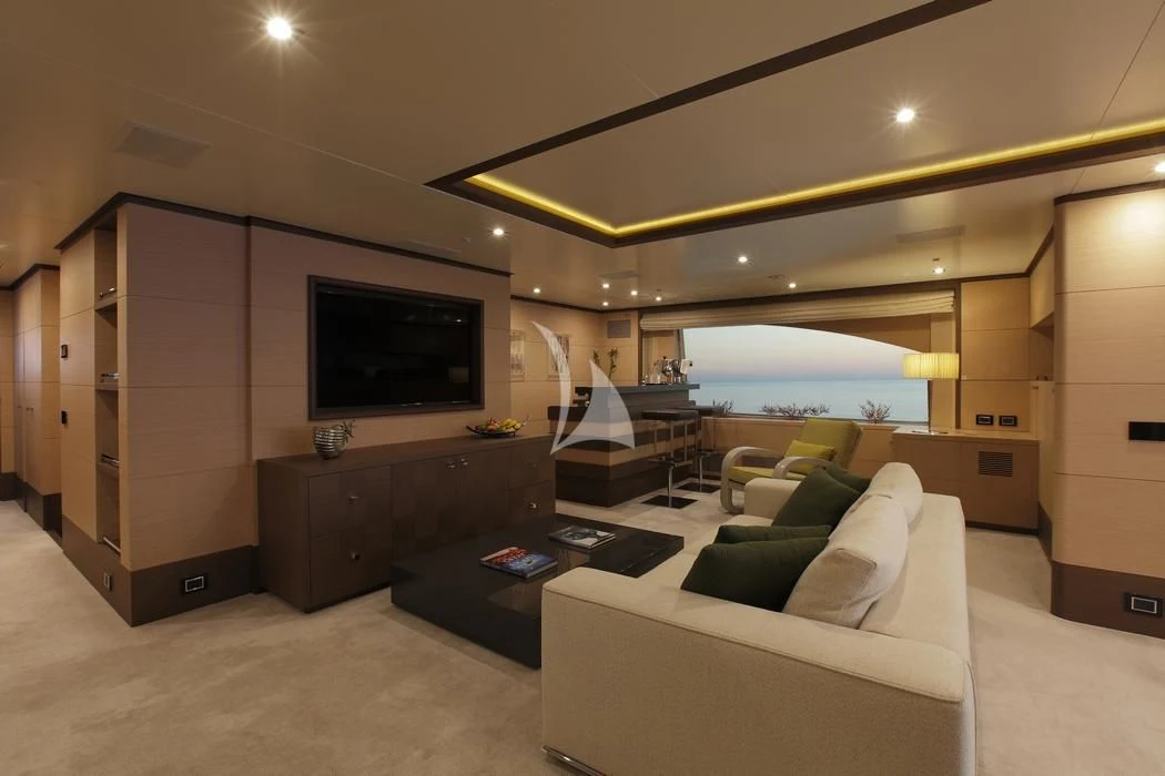 a living room with a large tv aboard LATIKO Yacht for Charter