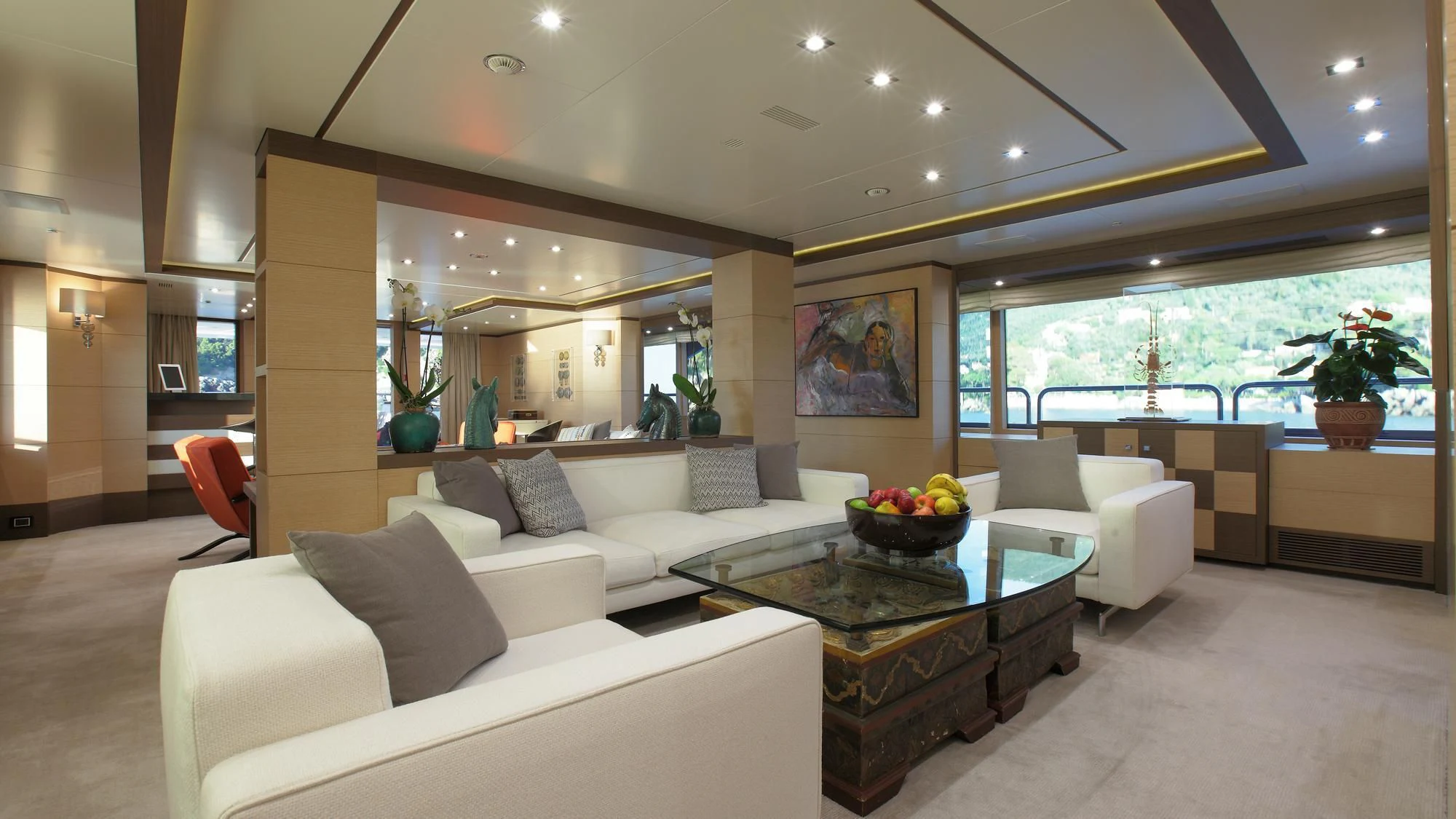 a living room with white couches aboard LATIKO Yacht for Charter