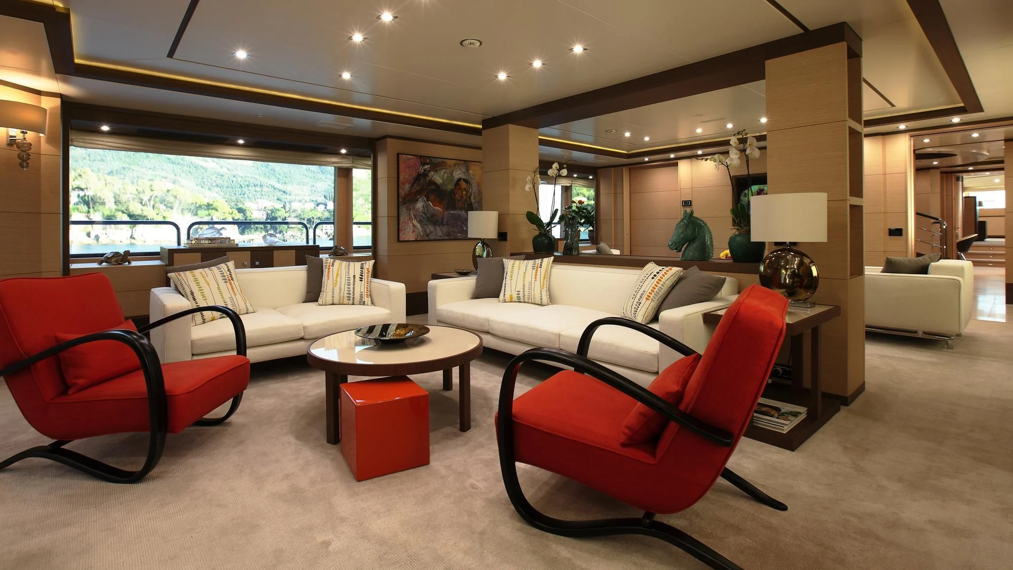 a living room with a large window aboard LATIKO Yacht for Charter