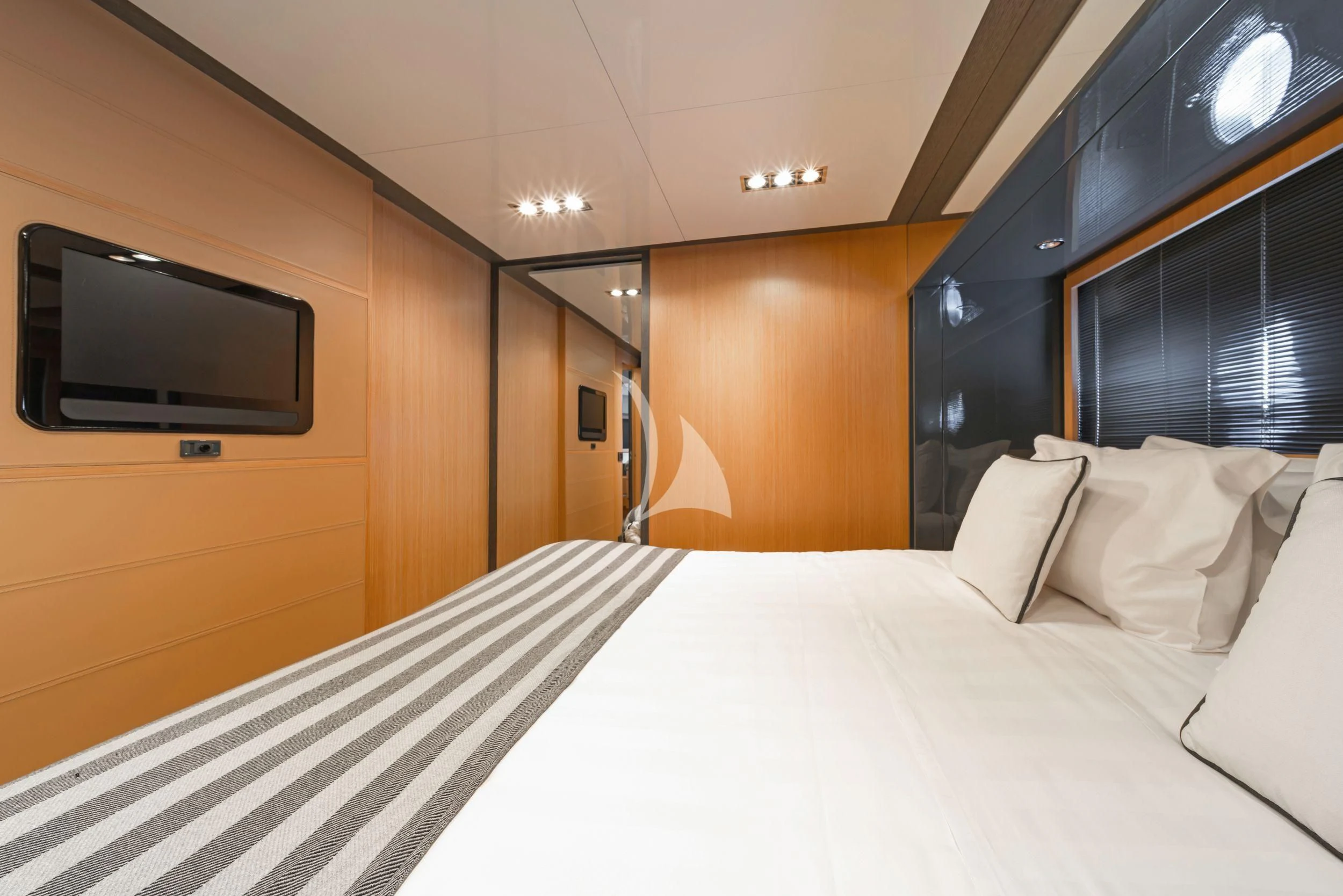 a hotel room with a bed aboard WHATEVER Yacht for Charter