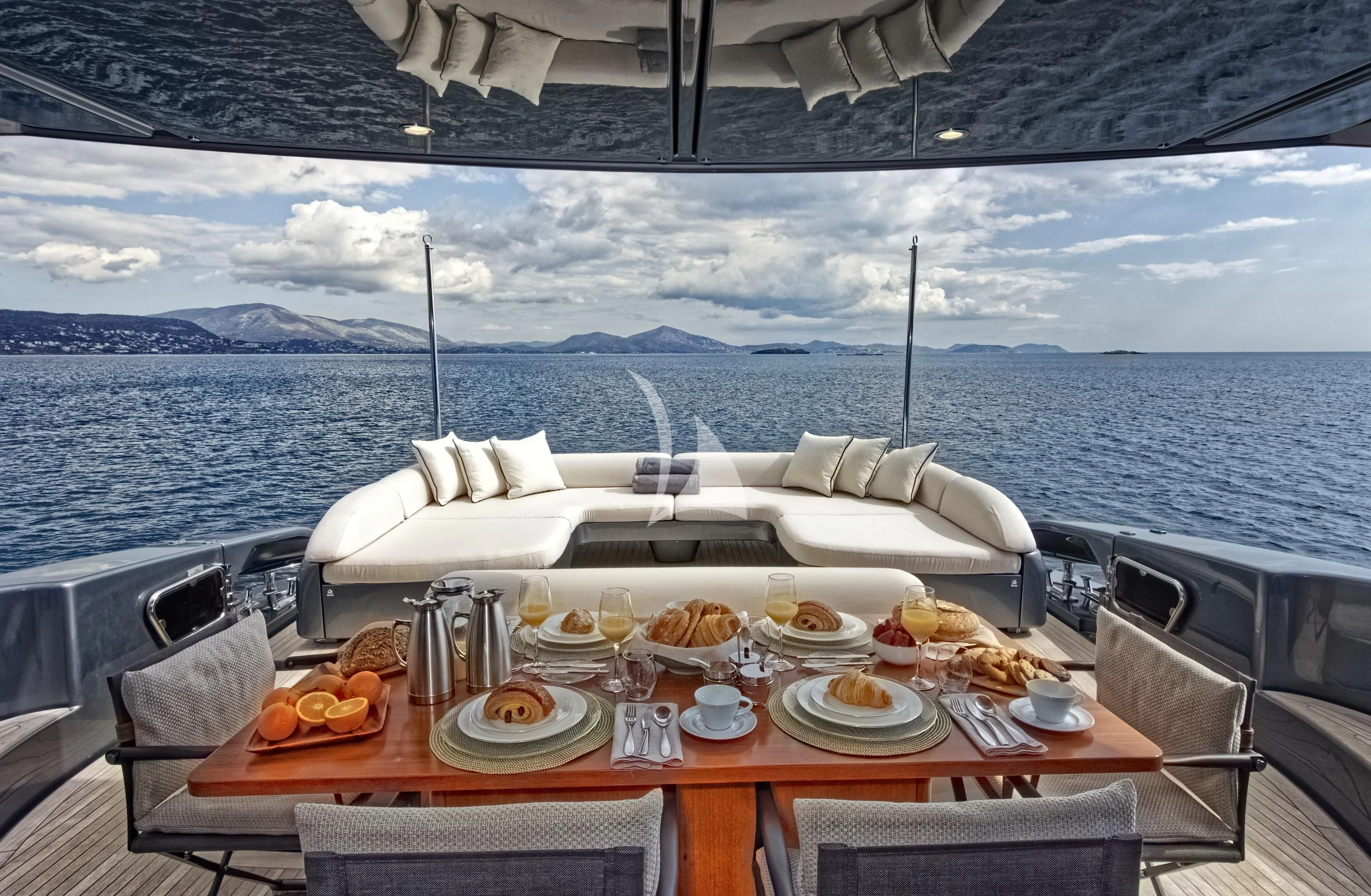 a table with food on it aboard WHATEVER Yacht for Charter