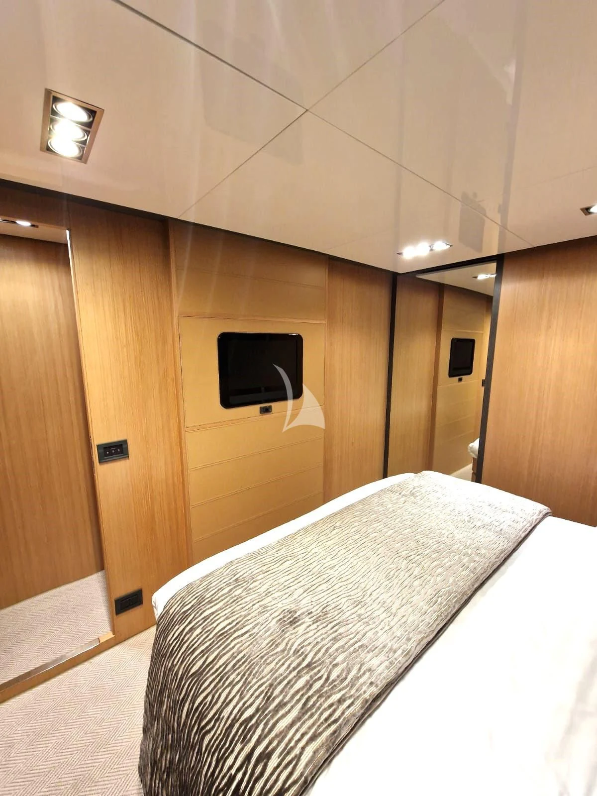 a bed in a room aboard WHATEVER Yacht for Charter