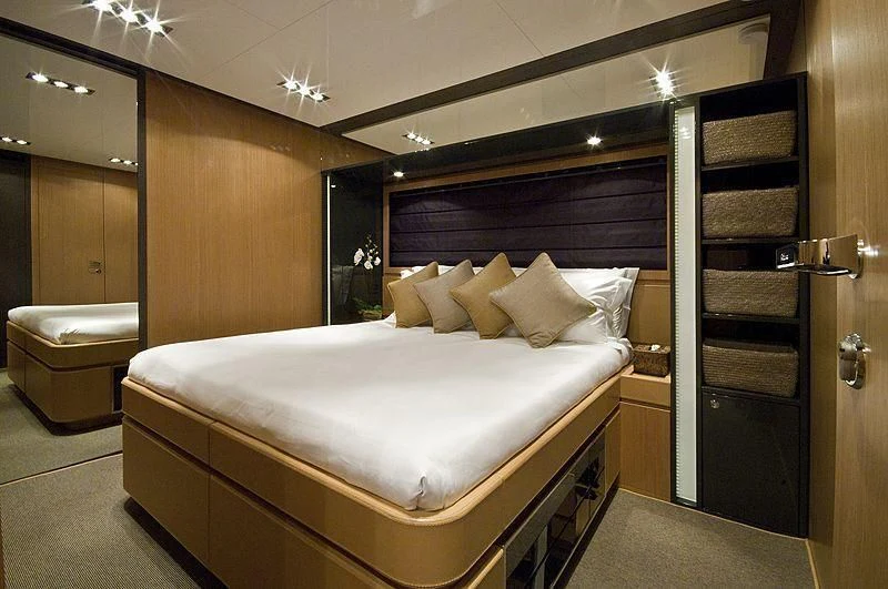 a bed in a room aboard WHATEVER Yacht for Charter