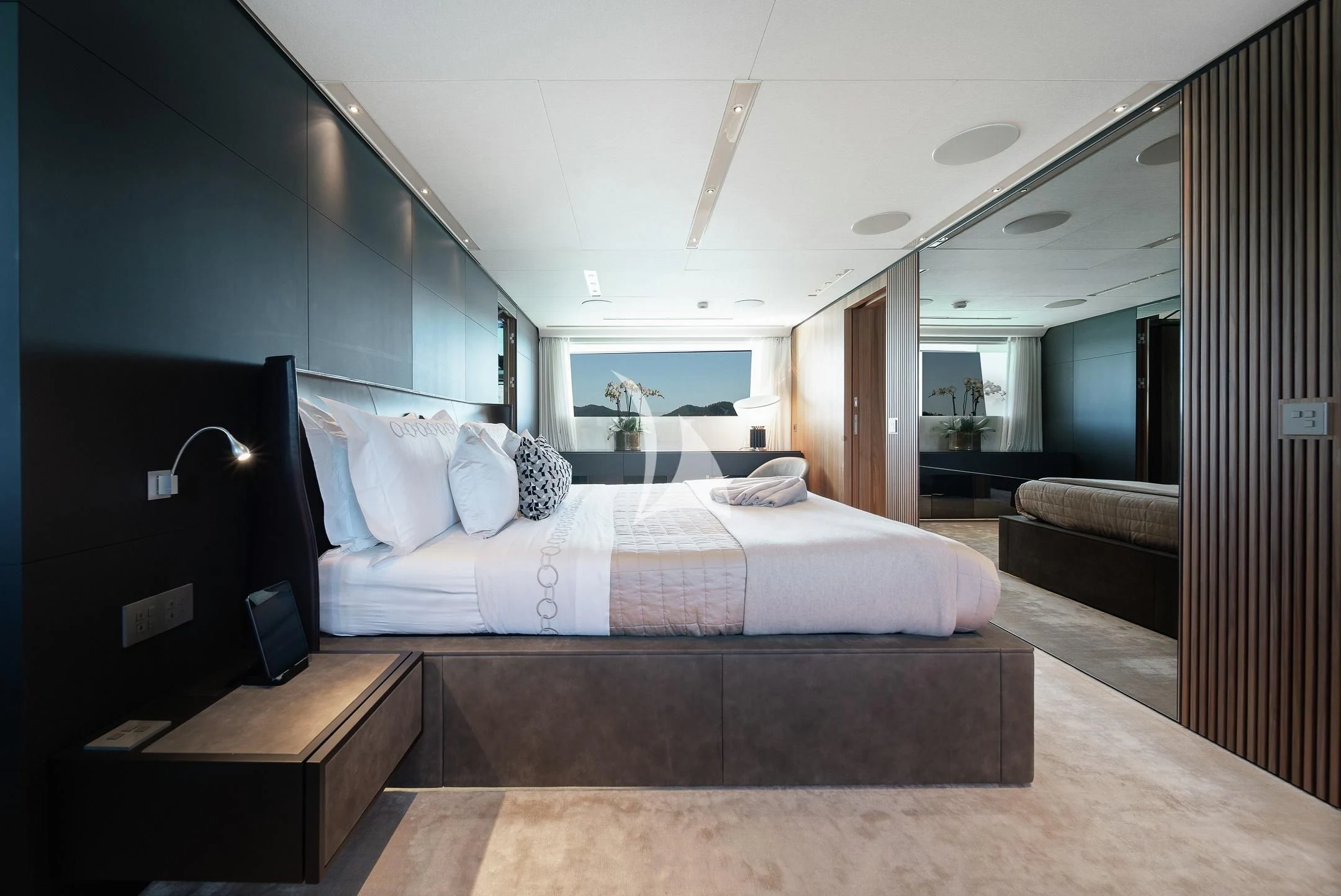a bed in a room aboard AIX Yacht for Sale
