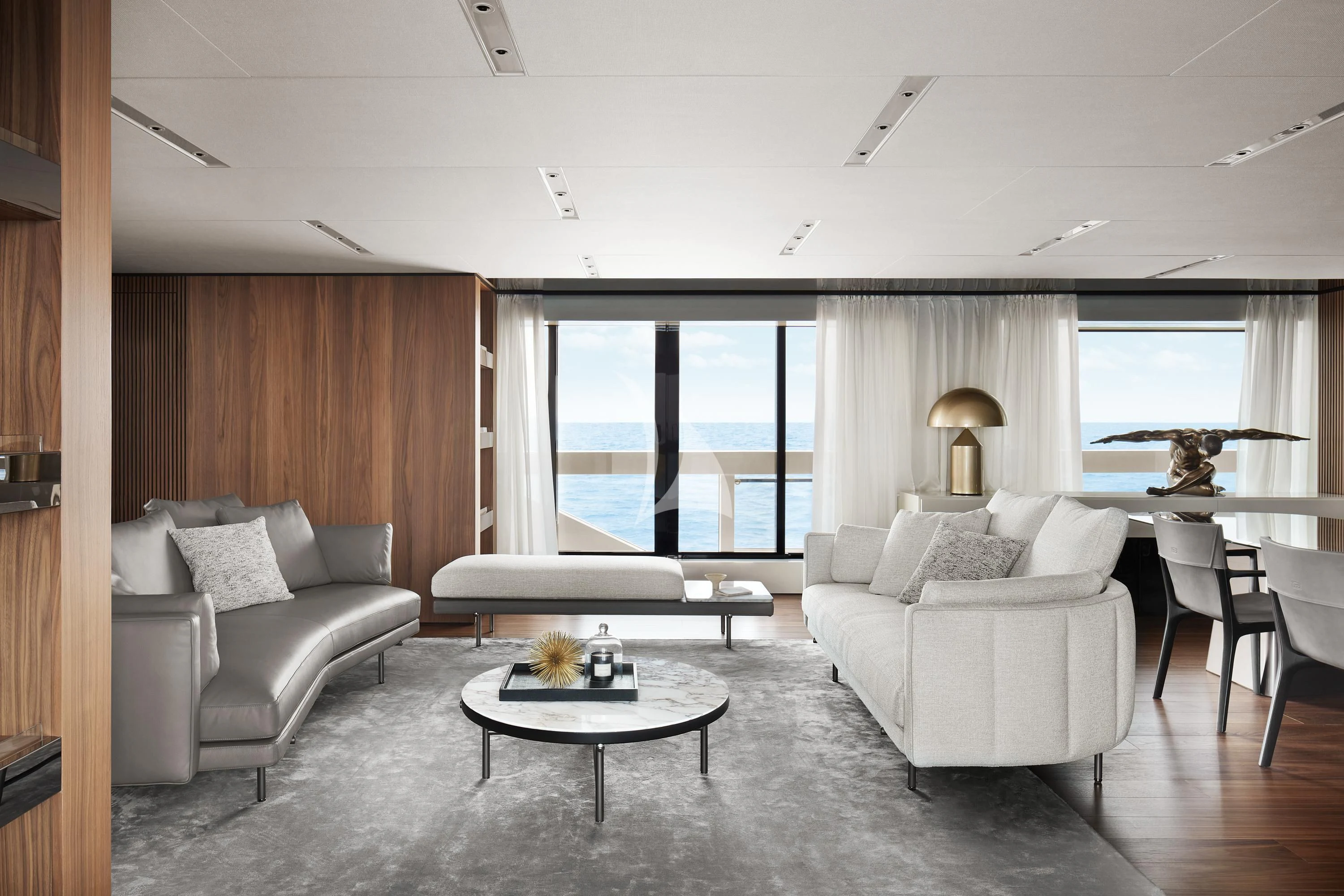 a living room with a large window aboard AIX Yacht for Sale