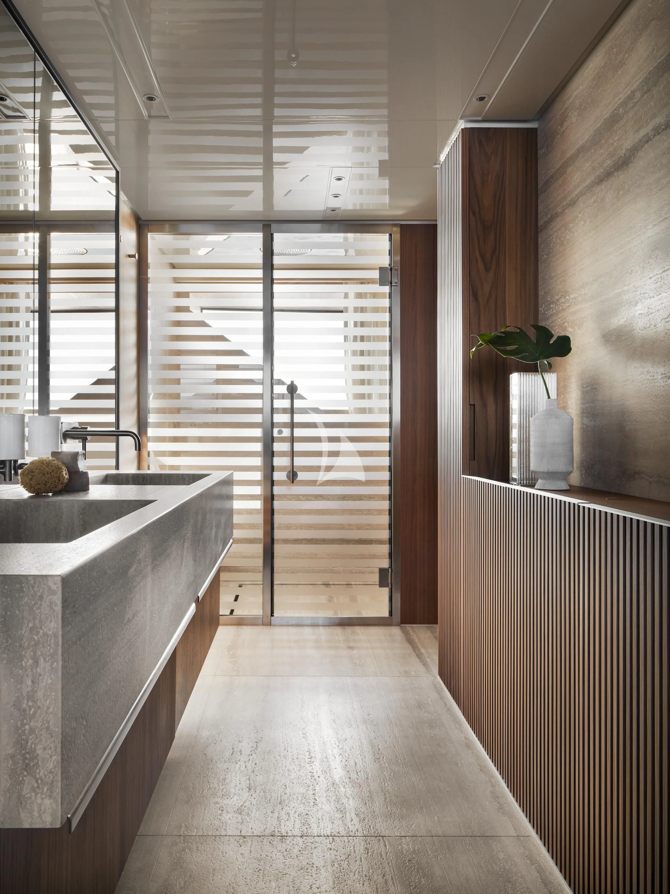 a long hallway with a large window aboard AIX Yacht for Sale