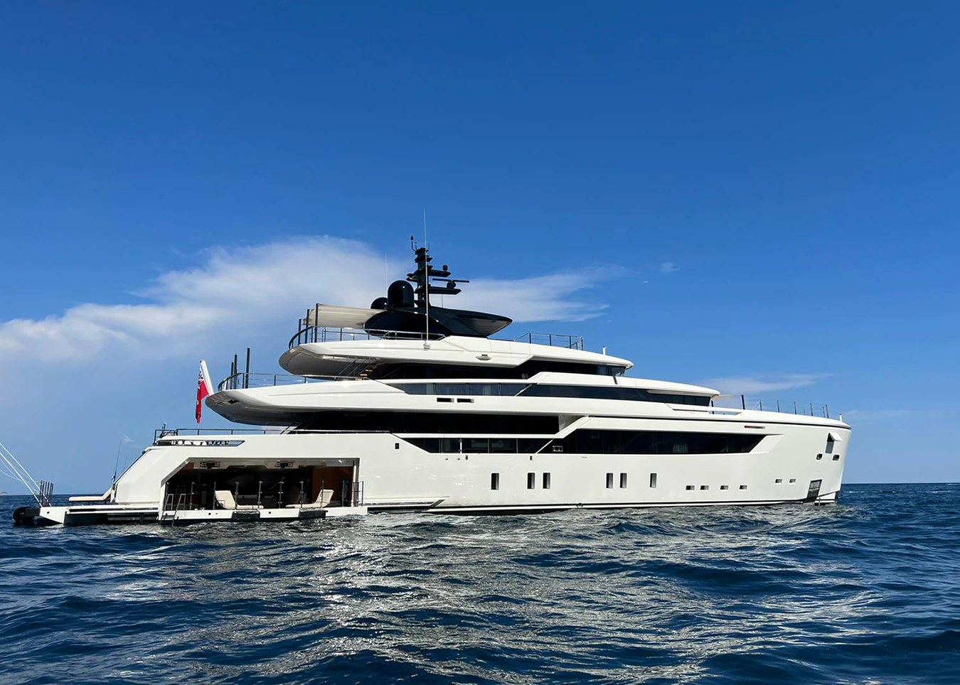 a large white boat in the water aboard AIX Yacht for Sale