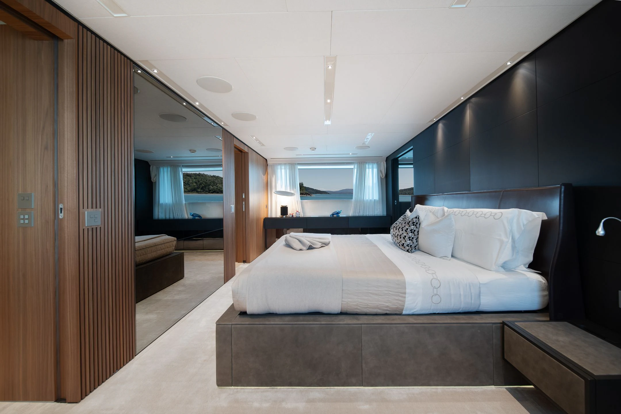 a bed in a room aboard AIX Yacht for Sale