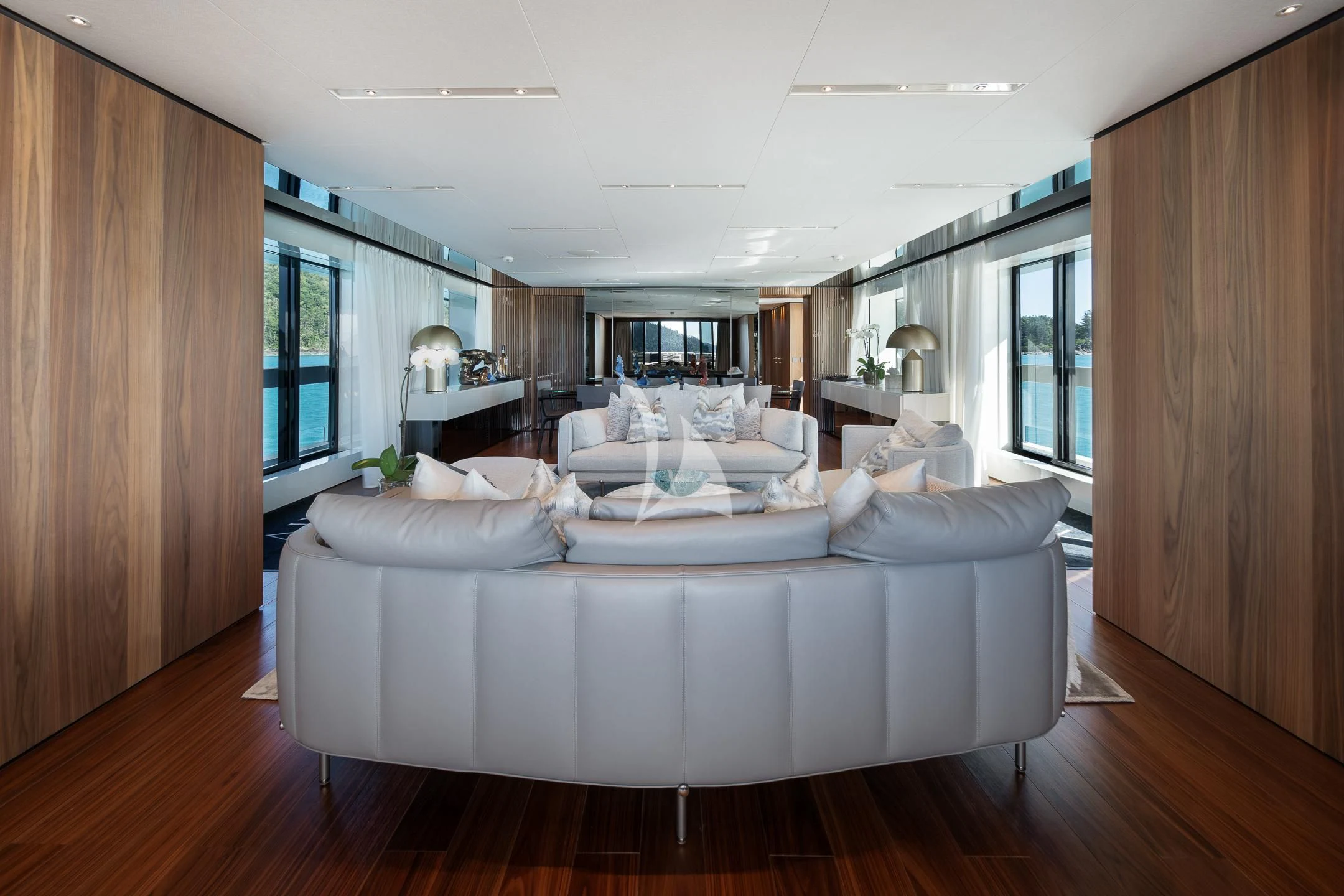 a room with a bed and a wood cabinet aboard AIX Yacht for Sale