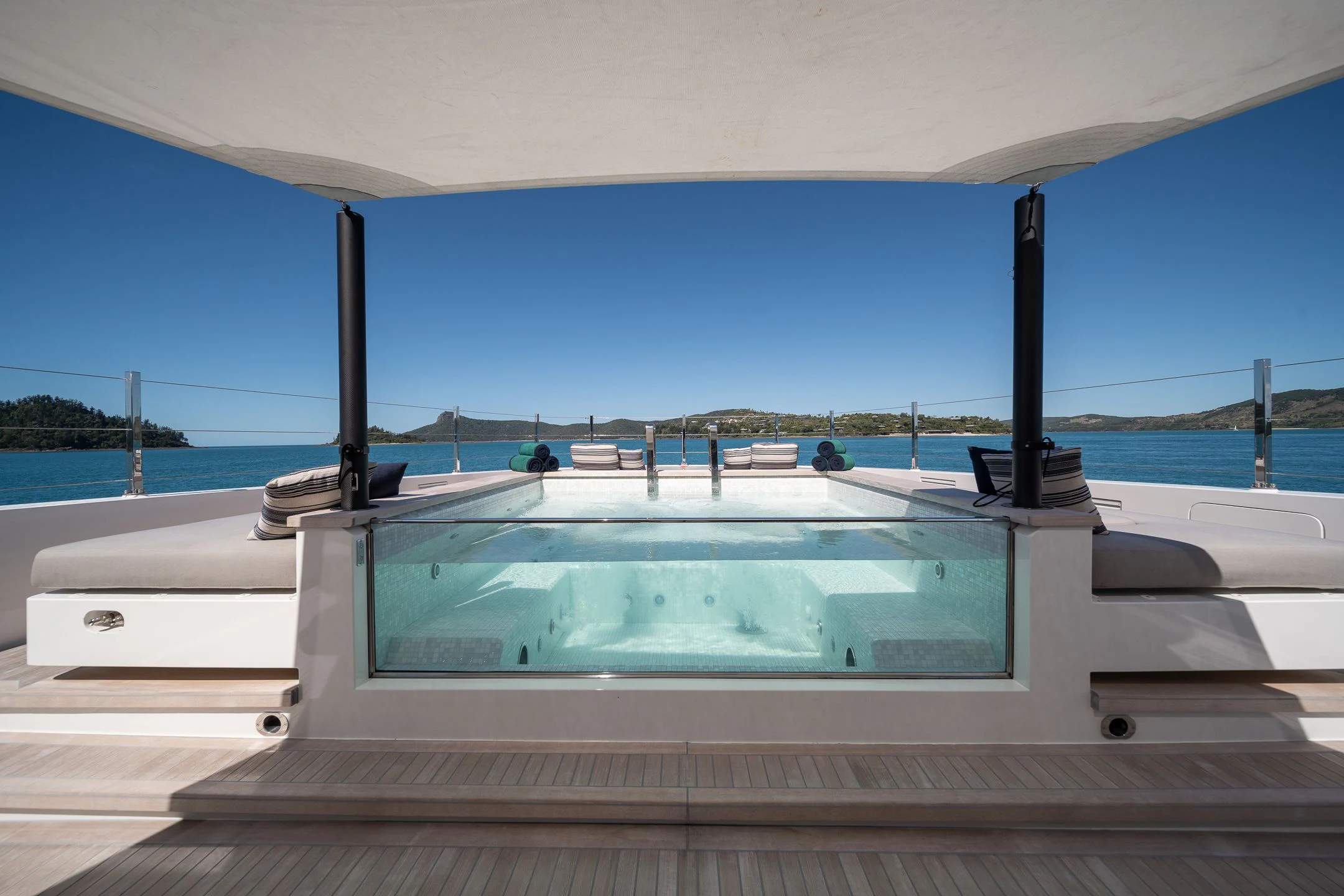 a large white boat on a dock aboard AIX Yacht for Sale