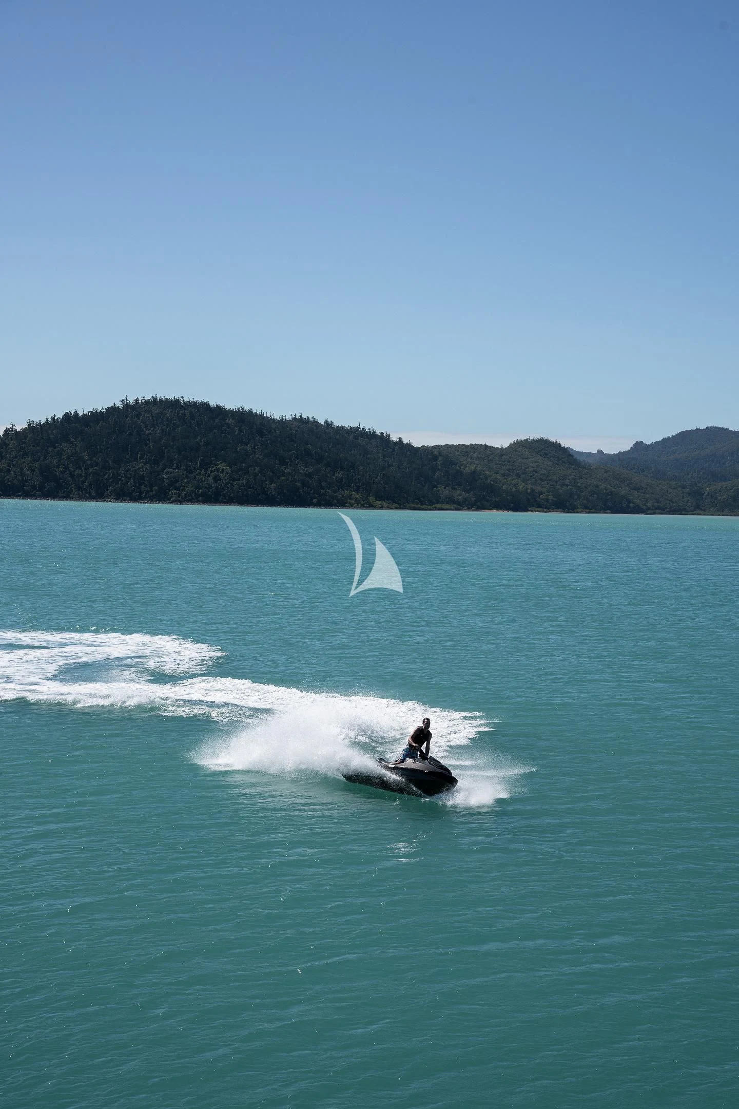 a person surfing on the sea aboard AIX Yacht for Sale