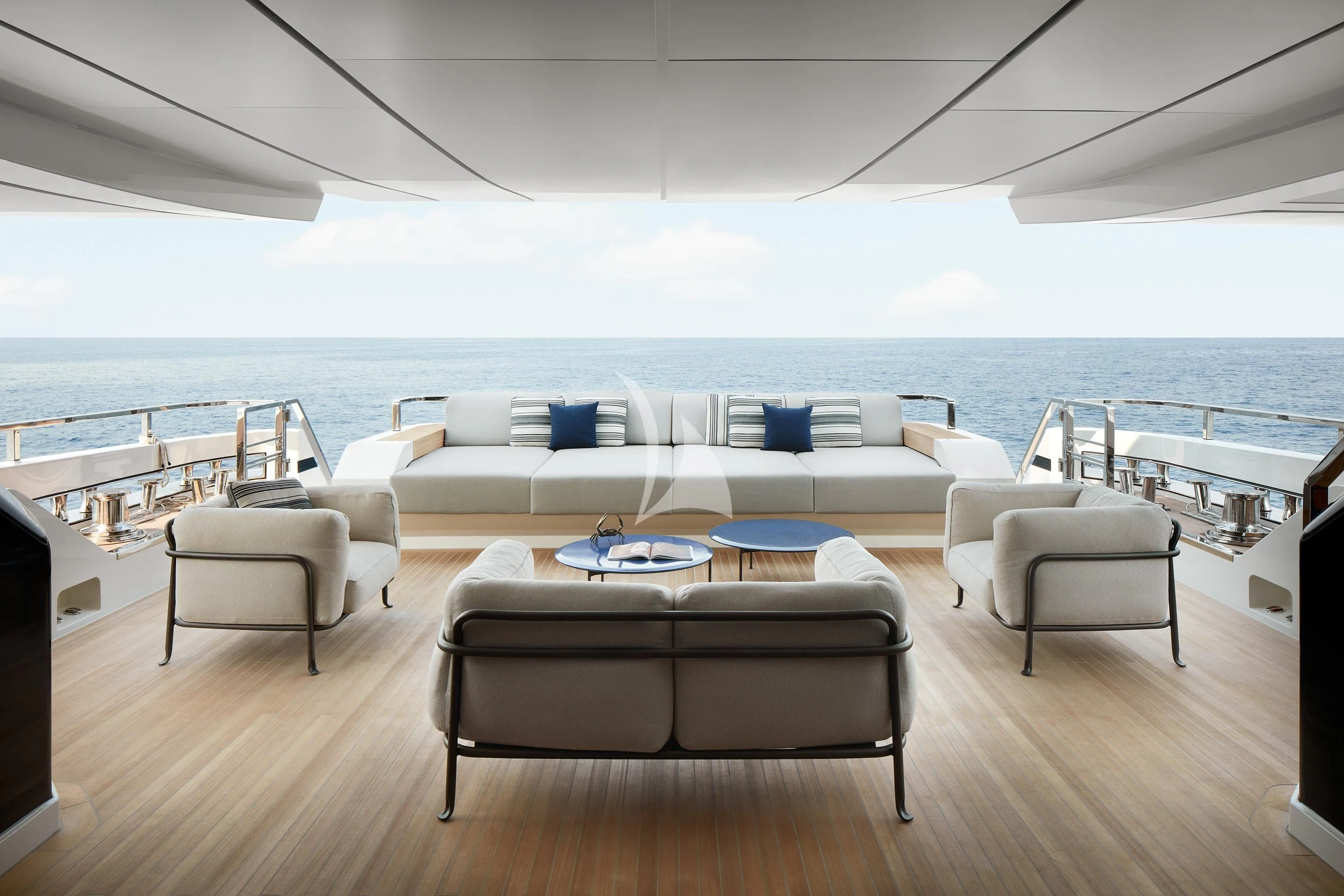 a living room with a large balcony aboard AIX Yacht for Sale