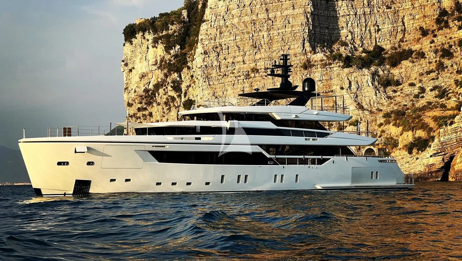 a white yacht in the water aboard AIX Yacht for Sale