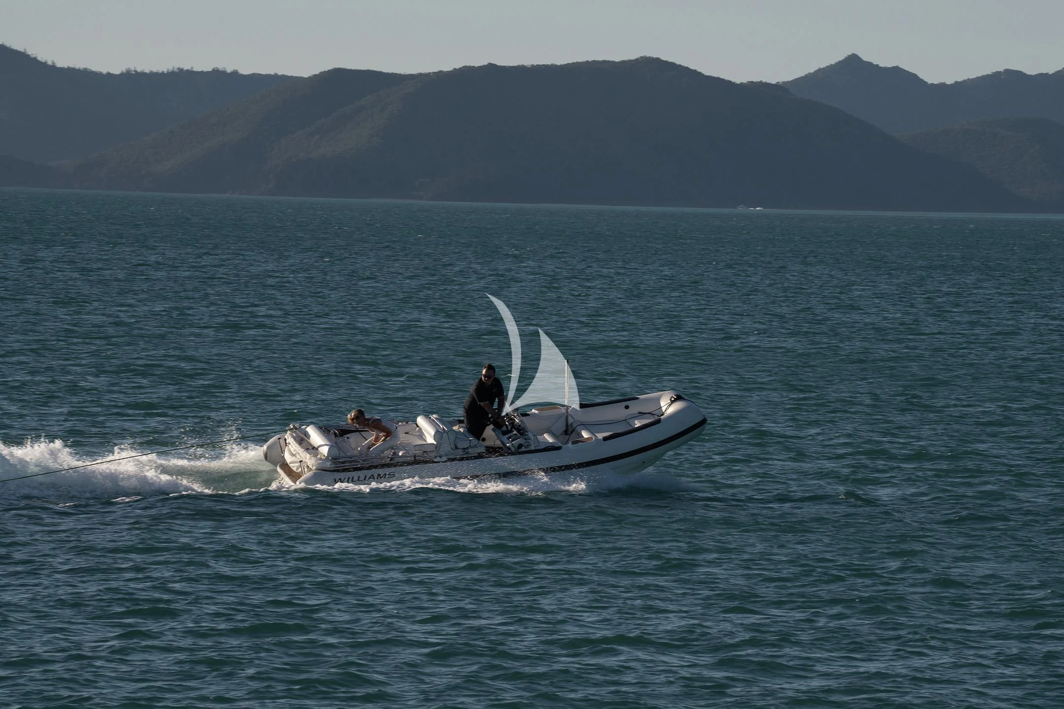 a boat with a person on it aboard AIX Yacht for Sale
