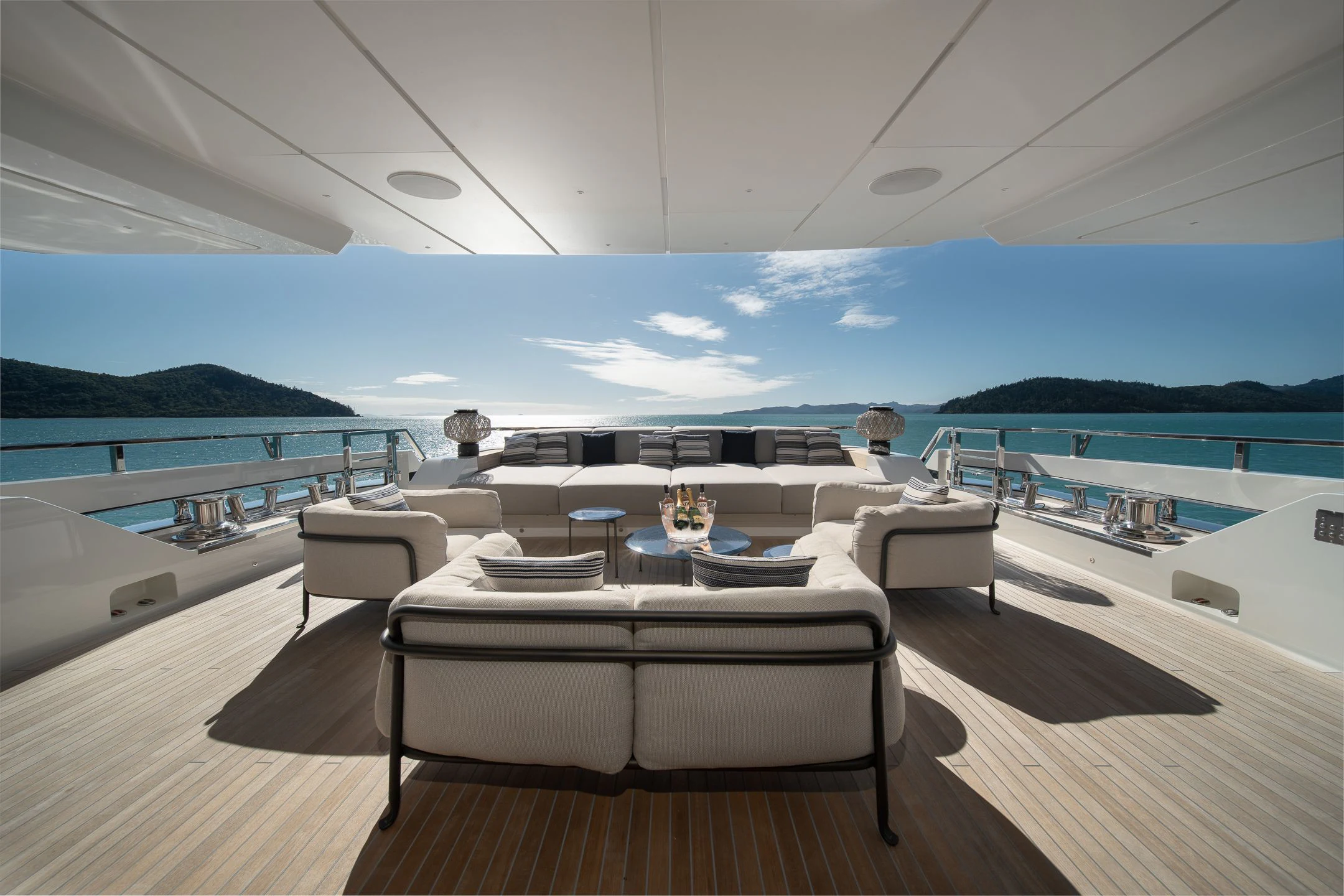 a room with a couch and a pool aboard AIX Yacht for Sale