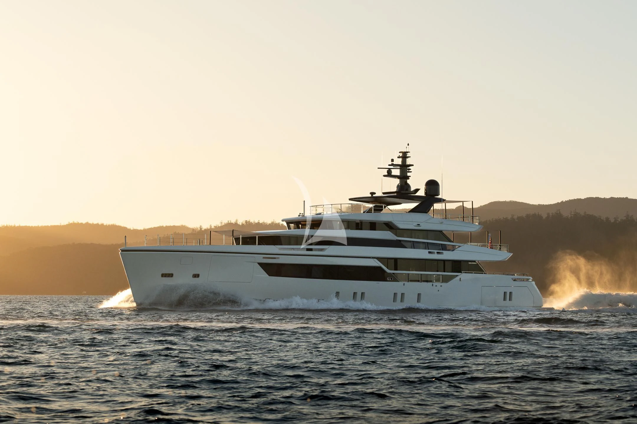 a large white ship on water aboard AIX Yacht for Sale