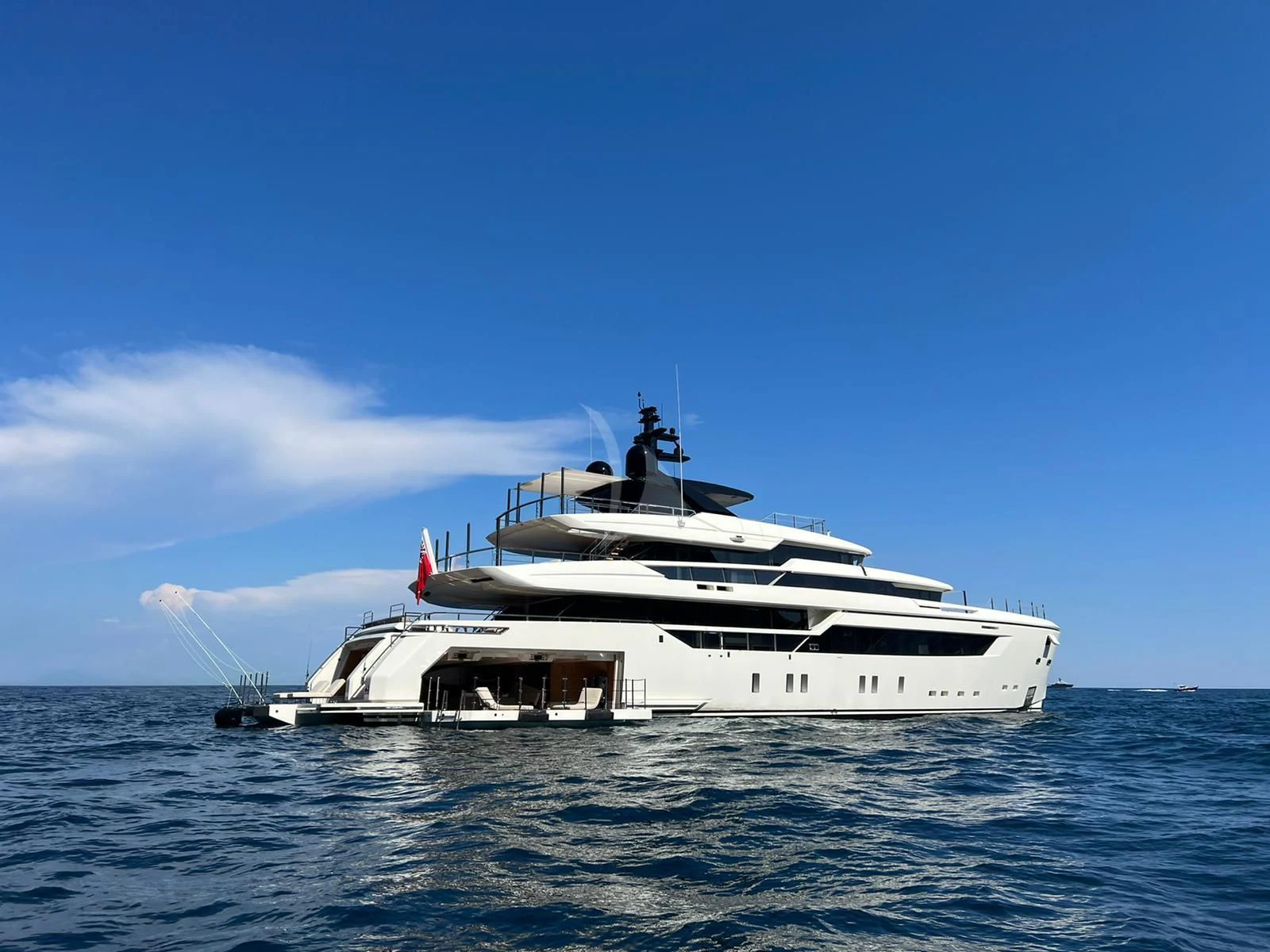 a white yacht in the water aboard AIX Yacht for Sale