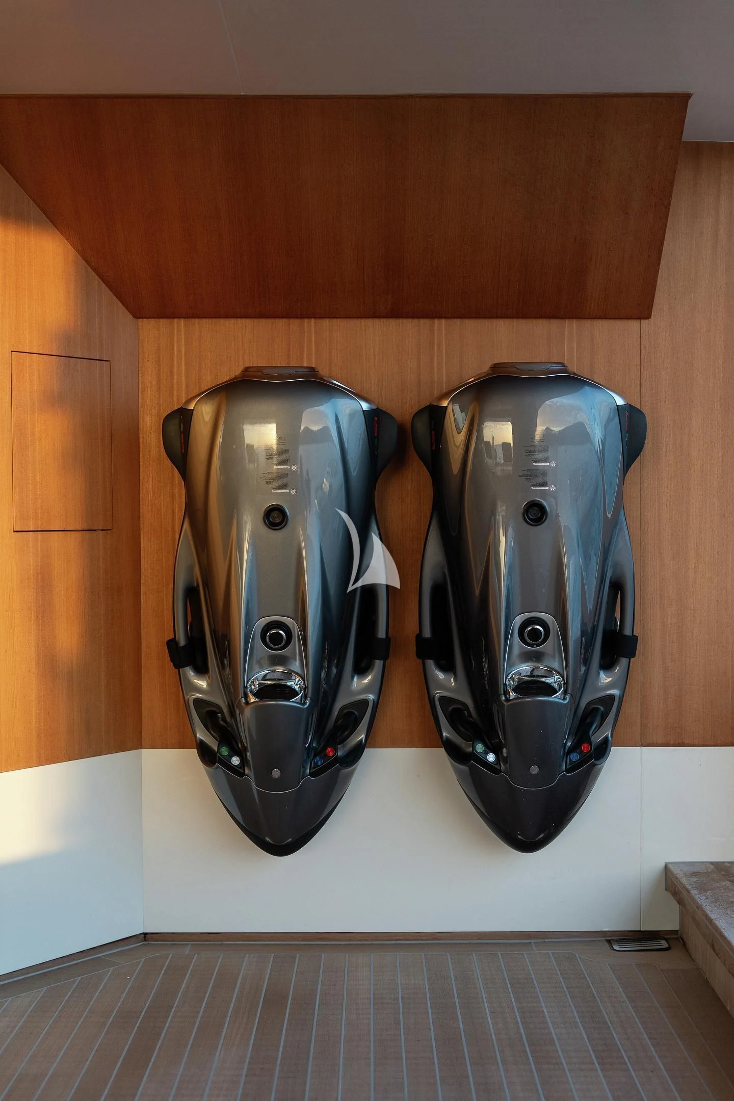 two metal helmets on a shelf aboard AIX Yacht for Sale