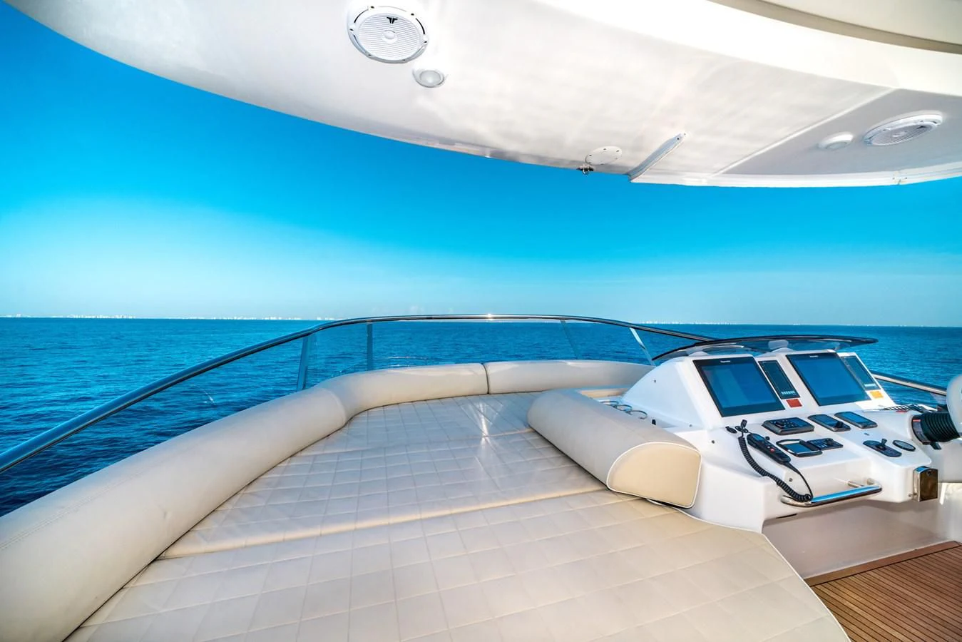a white car on a boat aboard AZIMUT 85 Yacht for Sale