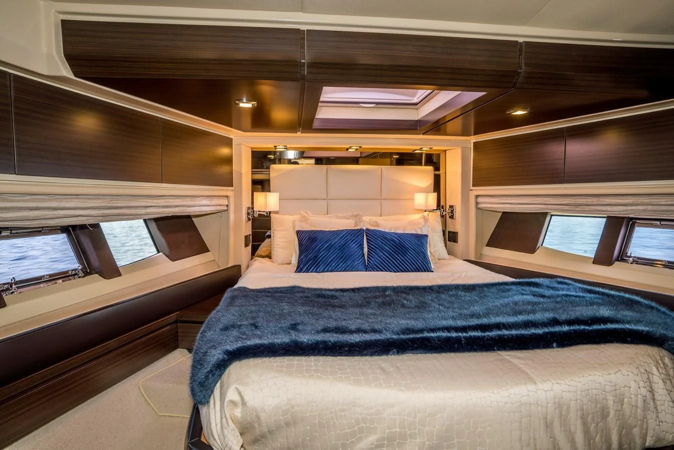 a bed in a room aboard AZIMUT 85 Yacht for Sale